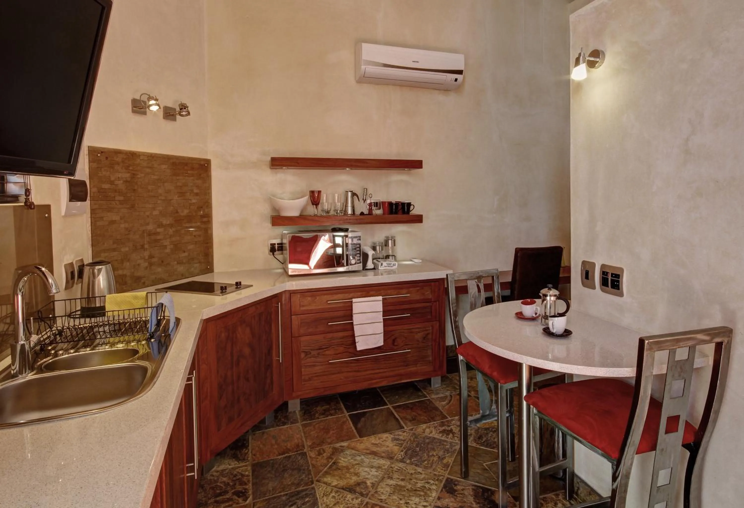 Kitchen or kitchenette in Hartmann Suites Serviced Self-Catering Apartments