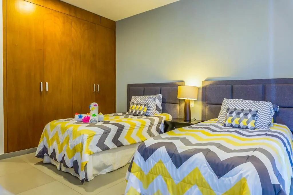 Bedroom, Bed in Lunada Condo by BVR