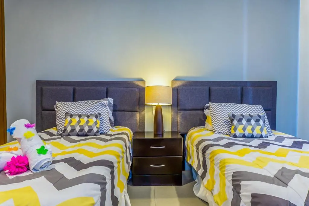 Photo of the whole room, Bed in Lunada Condo by BVR