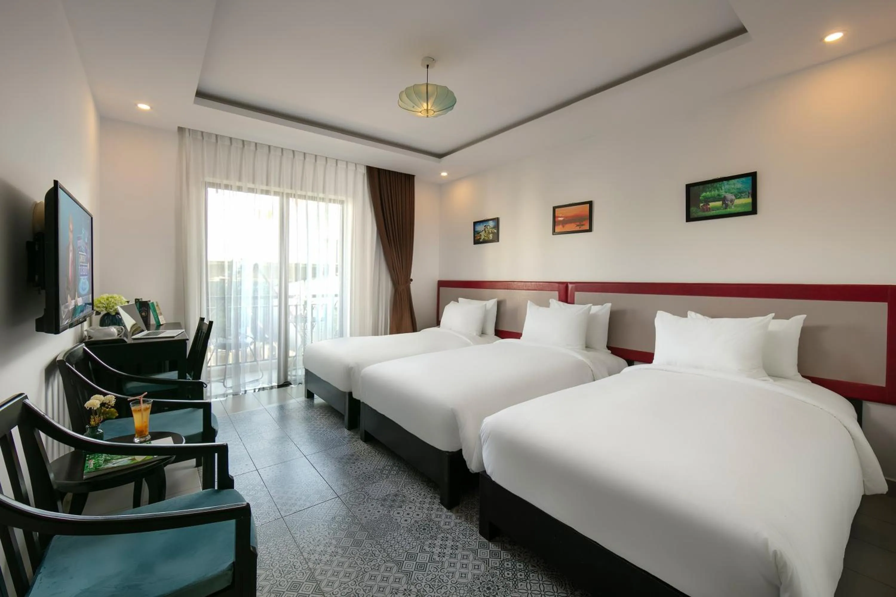 Communal lounge/ TV room, Bed in Hoi An Rose Garden Hotel