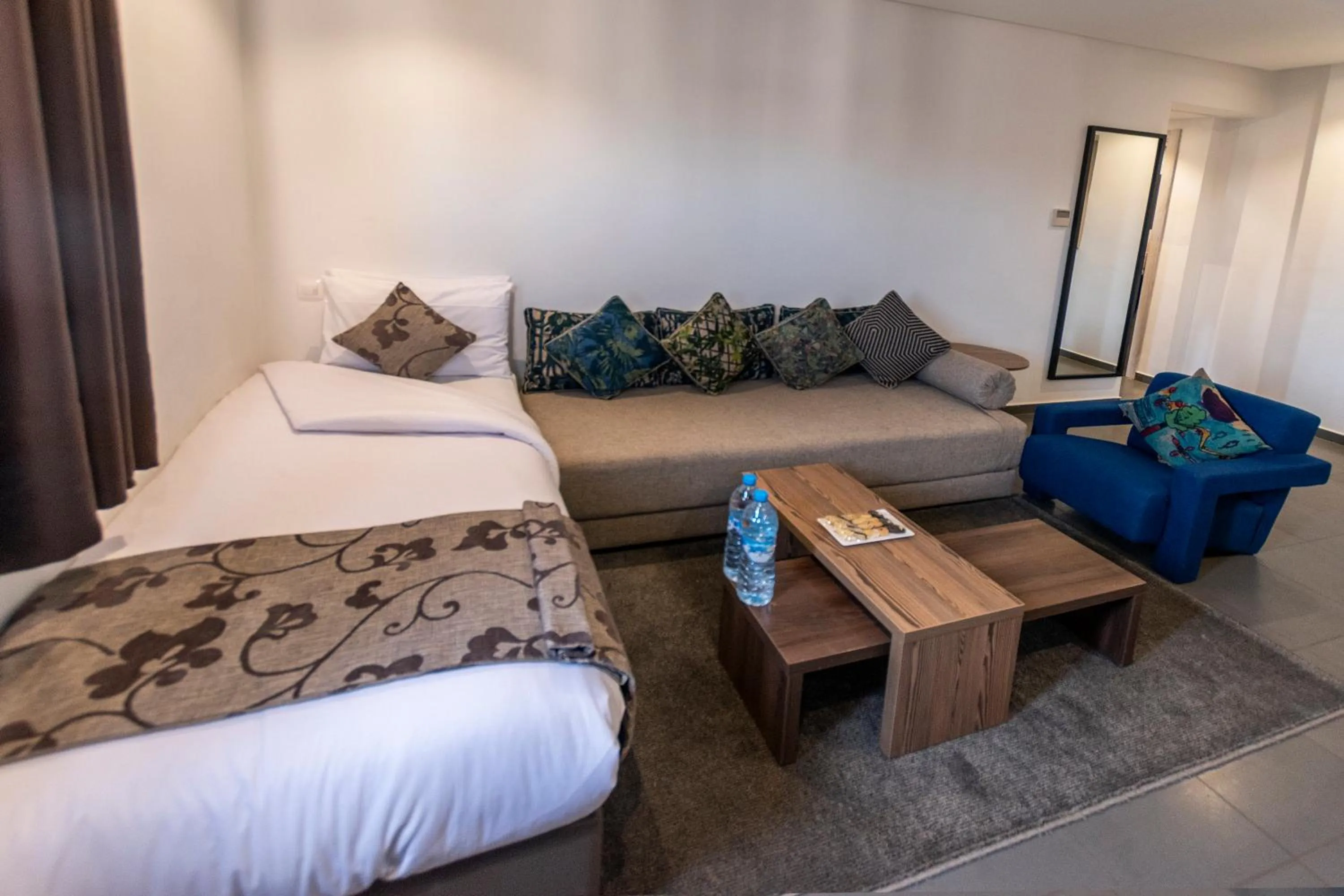 Bed in Wazo Appart-Hôtel