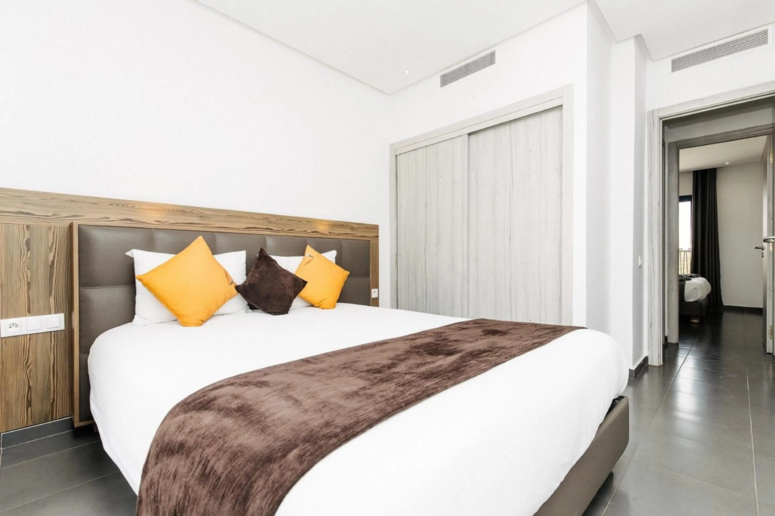 Bedroom, Bed in Wazo Appart-Hôtel