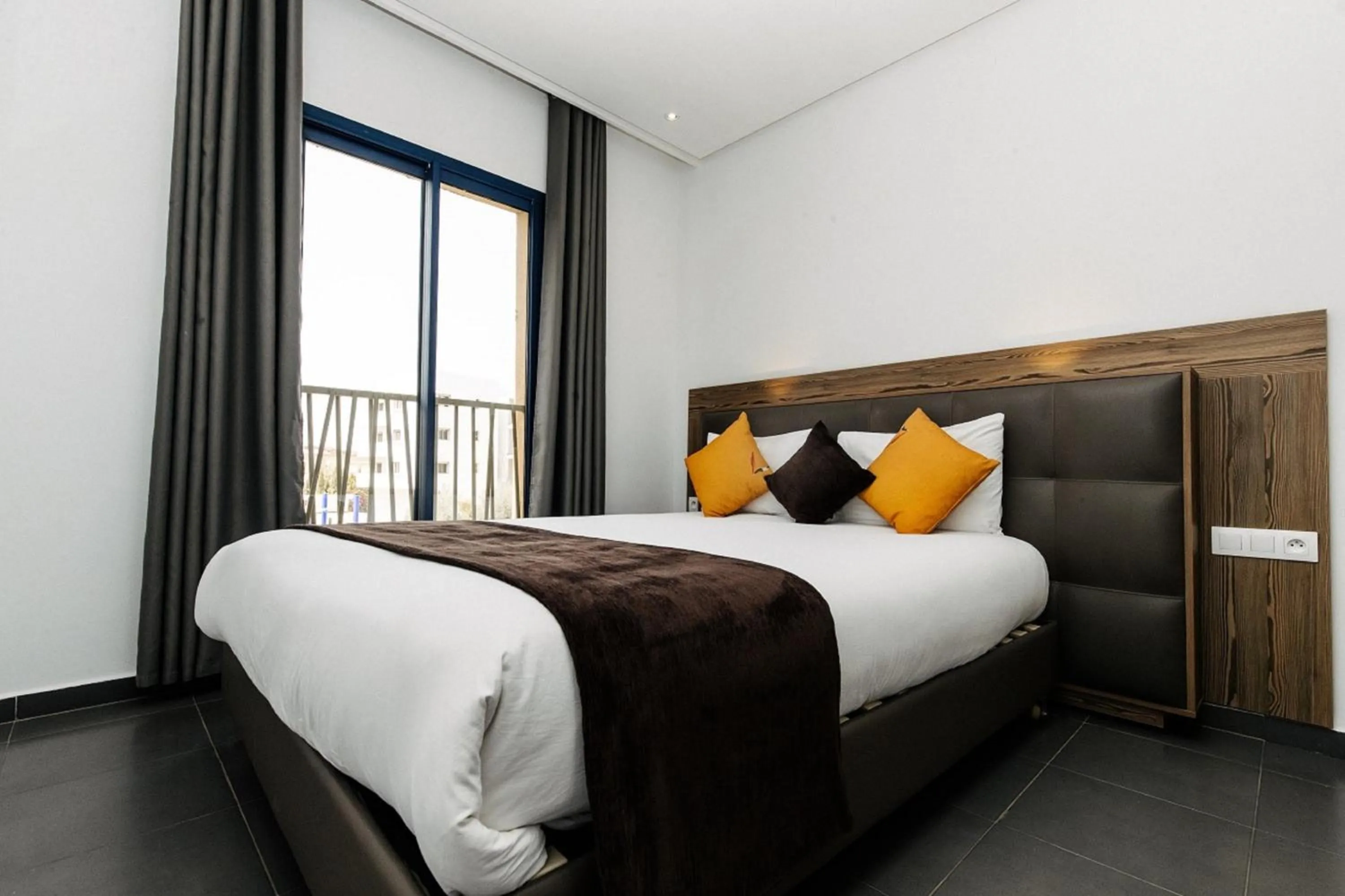 Bedroom, Bed in Wazo Appart-Hôtel