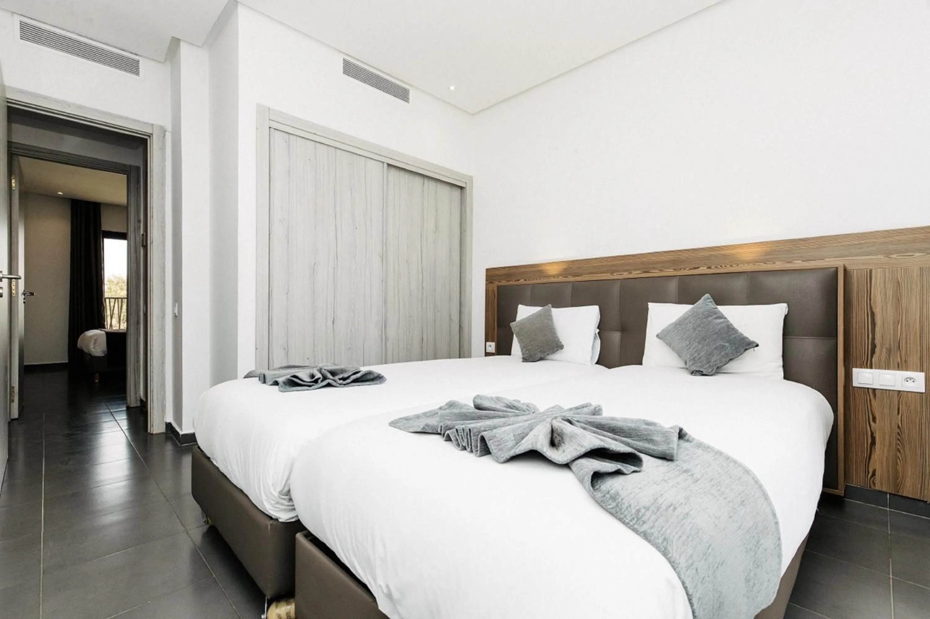 Bed in Wazo Appart-Hôtel