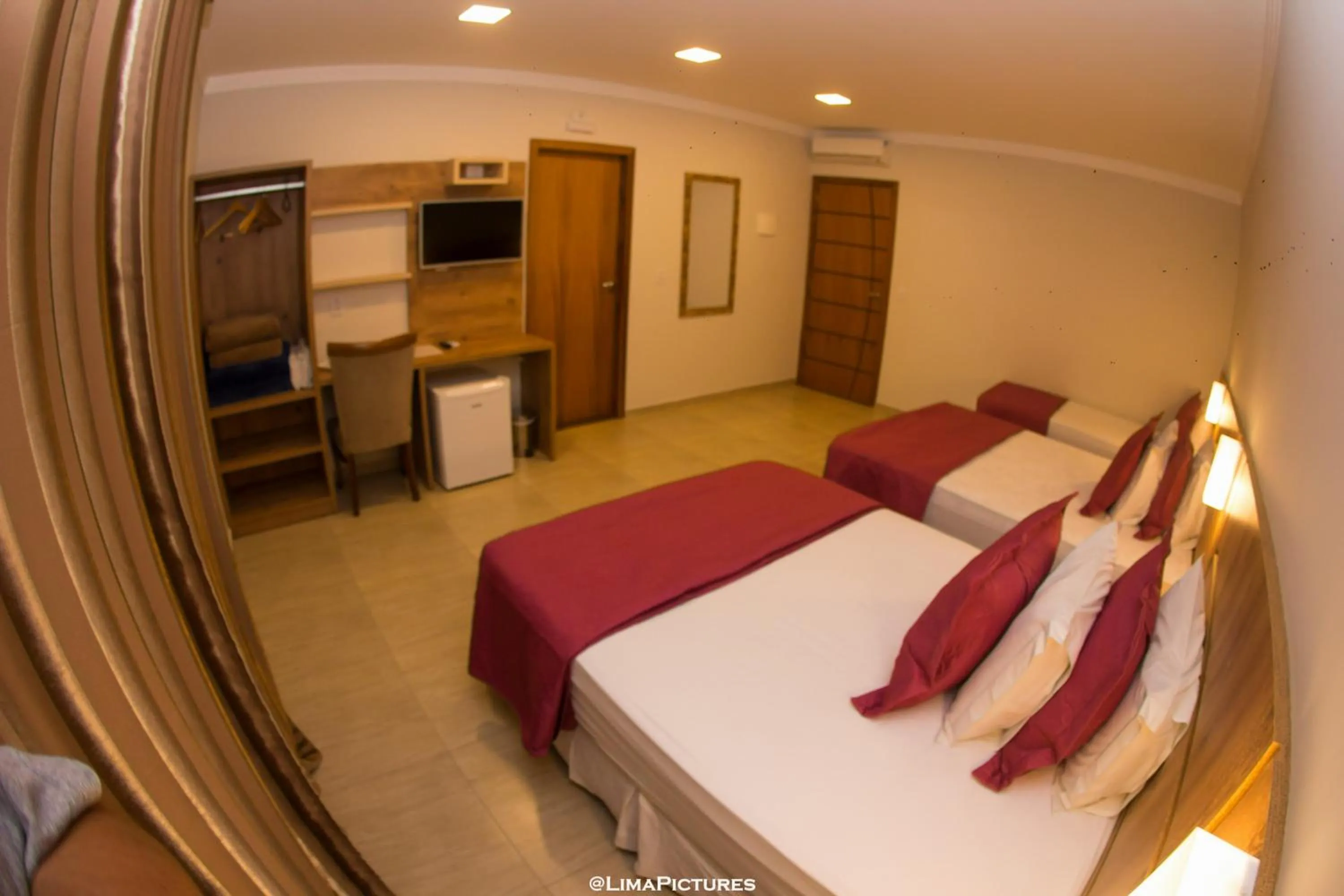 Bed in Pousada Villarejo Armação