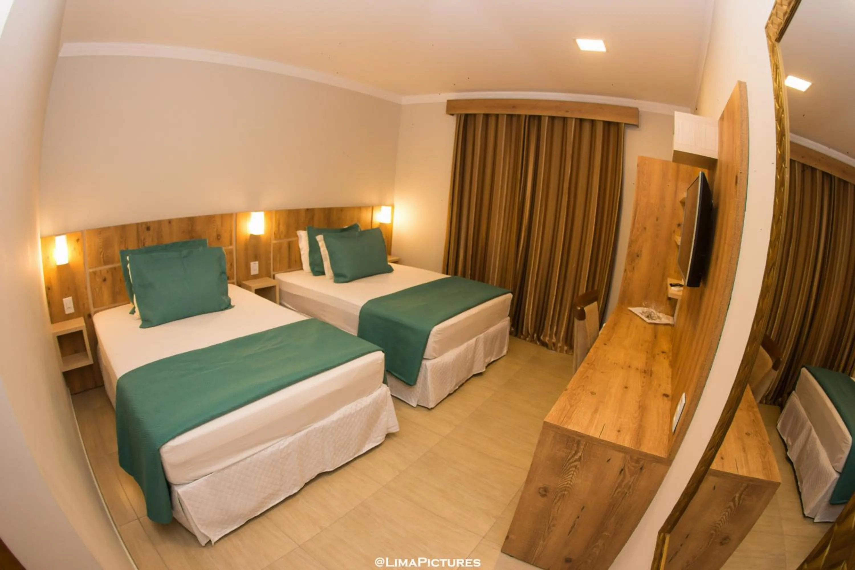 Bed in Pousada Villarejo Armação