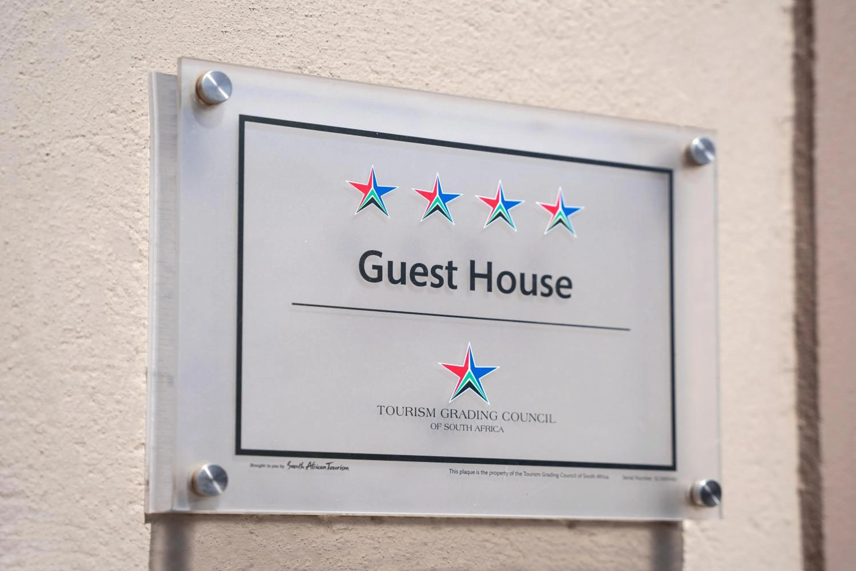 Property logo or sign in Q's Boutique Stay