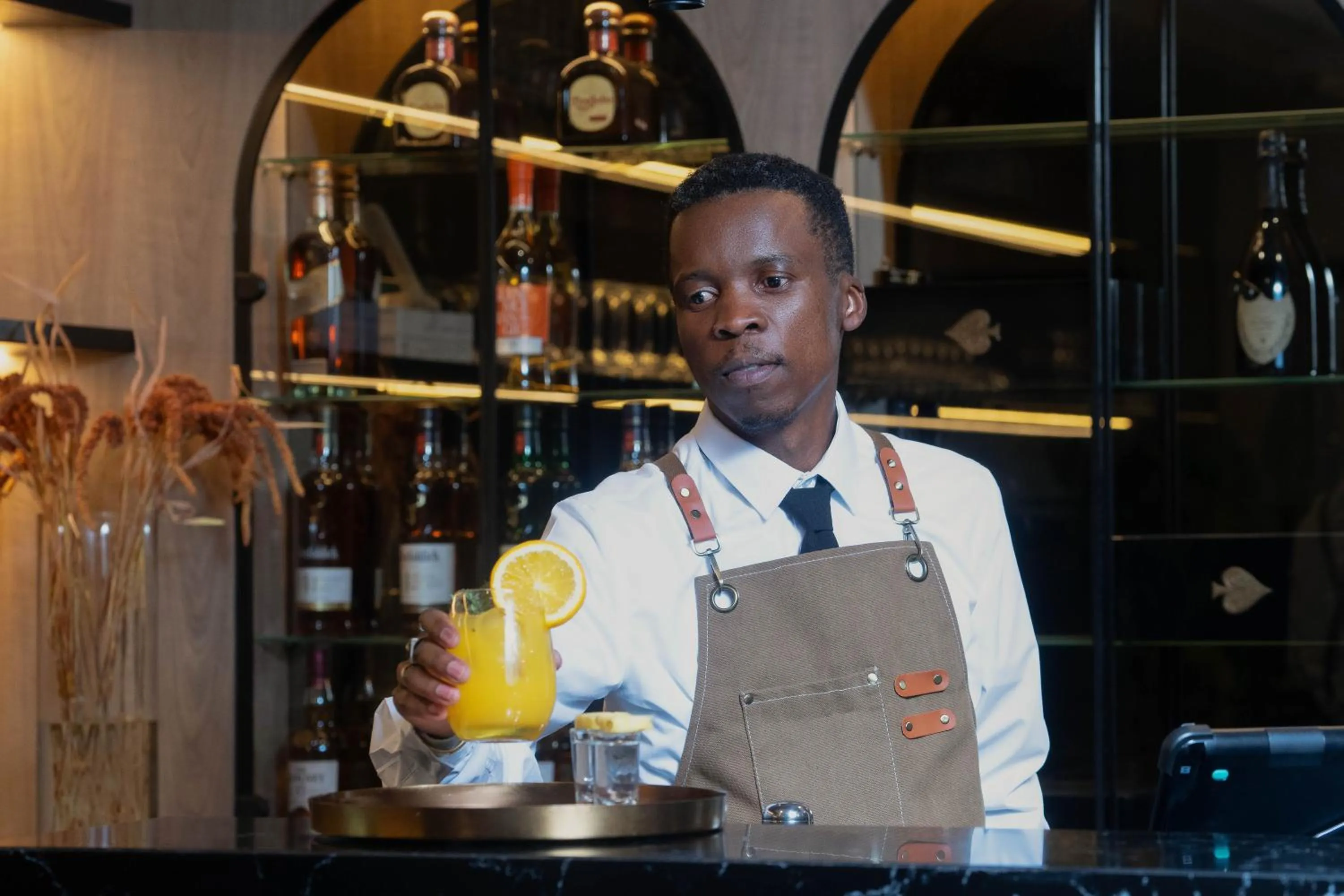 Drinks in Q's Boutique Stay