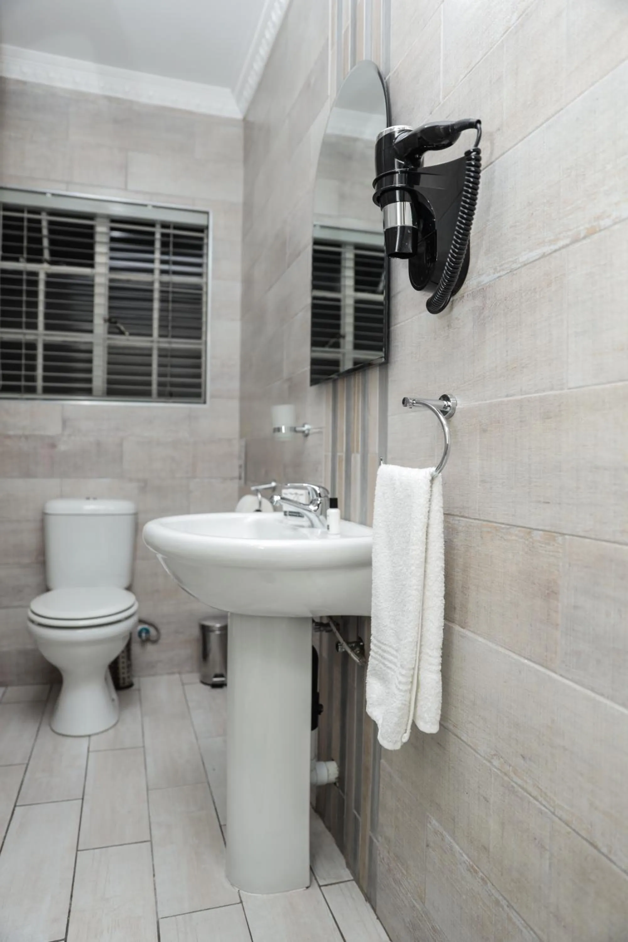 Bathroom in Q's Boutique Stay