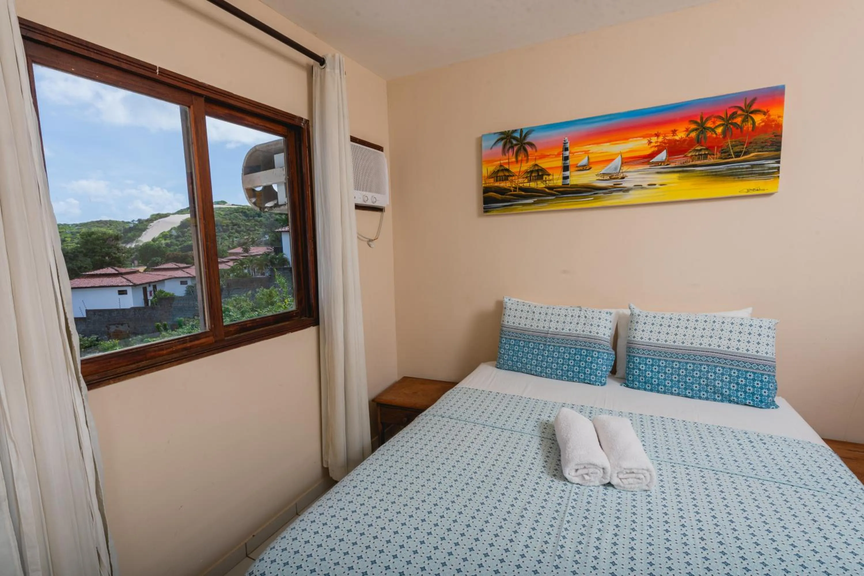 Bed in Apartamentos Natal Ponta Negra Vista Espetacular para o Mar