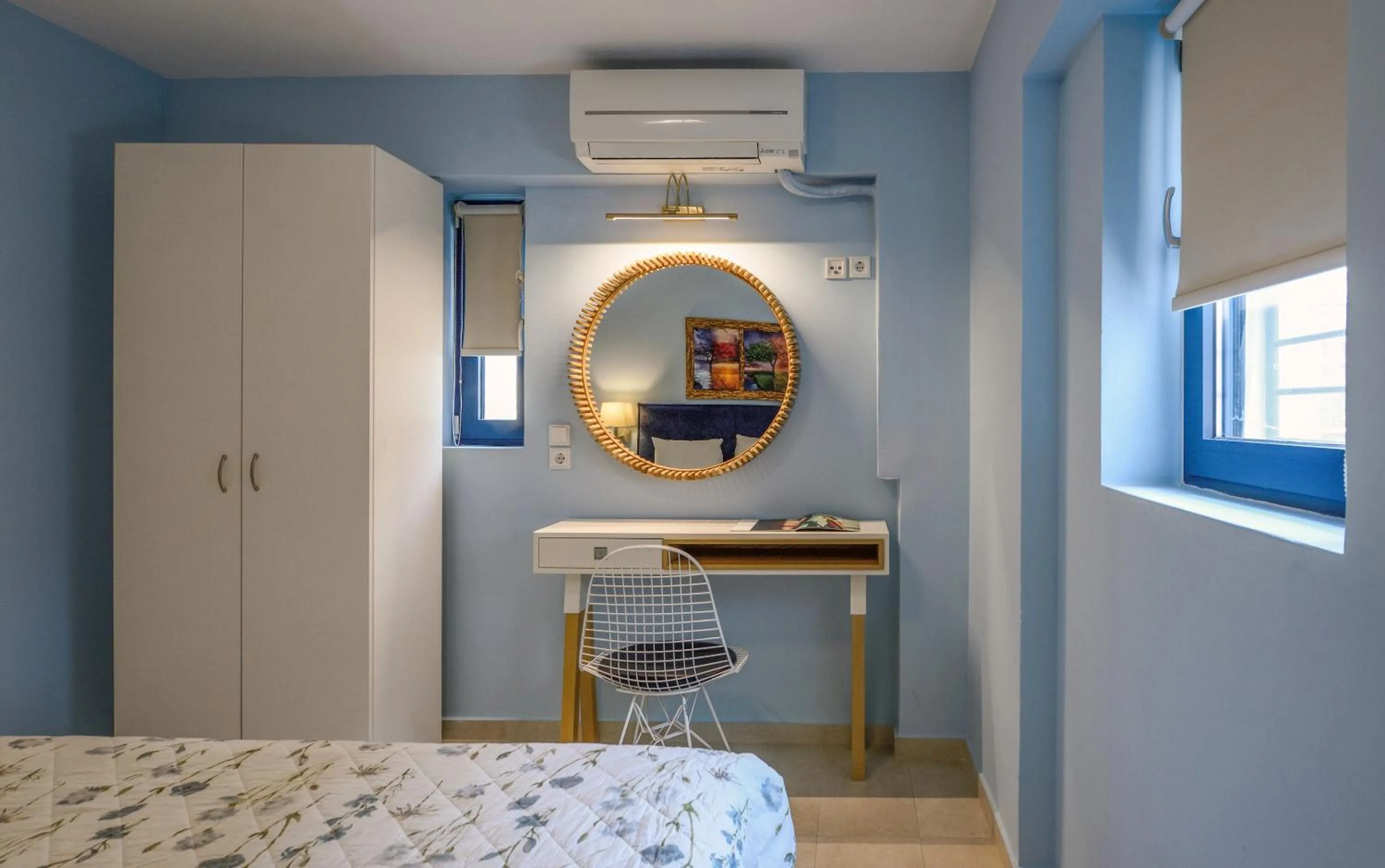 Bed in Elpiniki Luxury Apartments