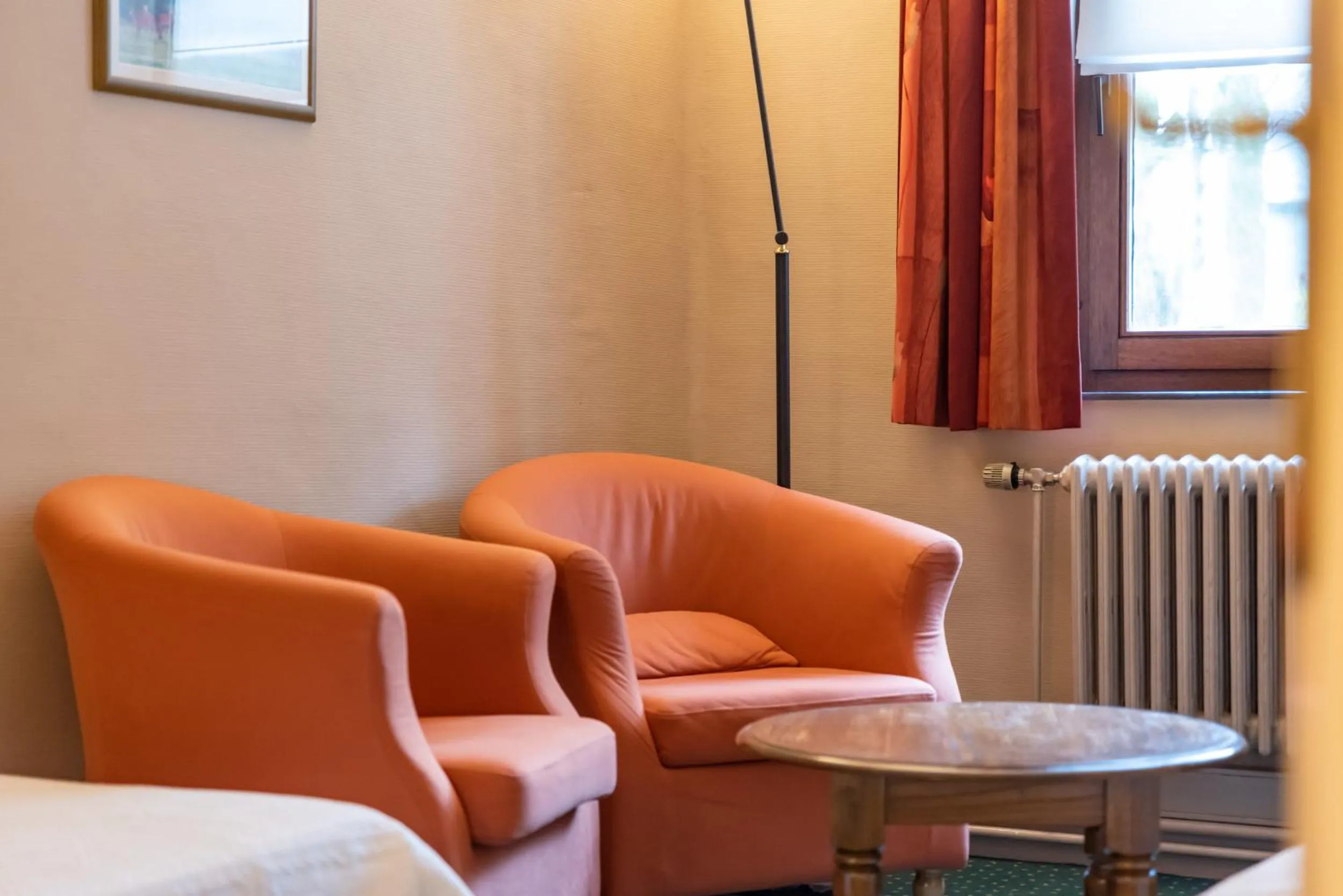 Seating area in Hôtel Le Cor de Chasse