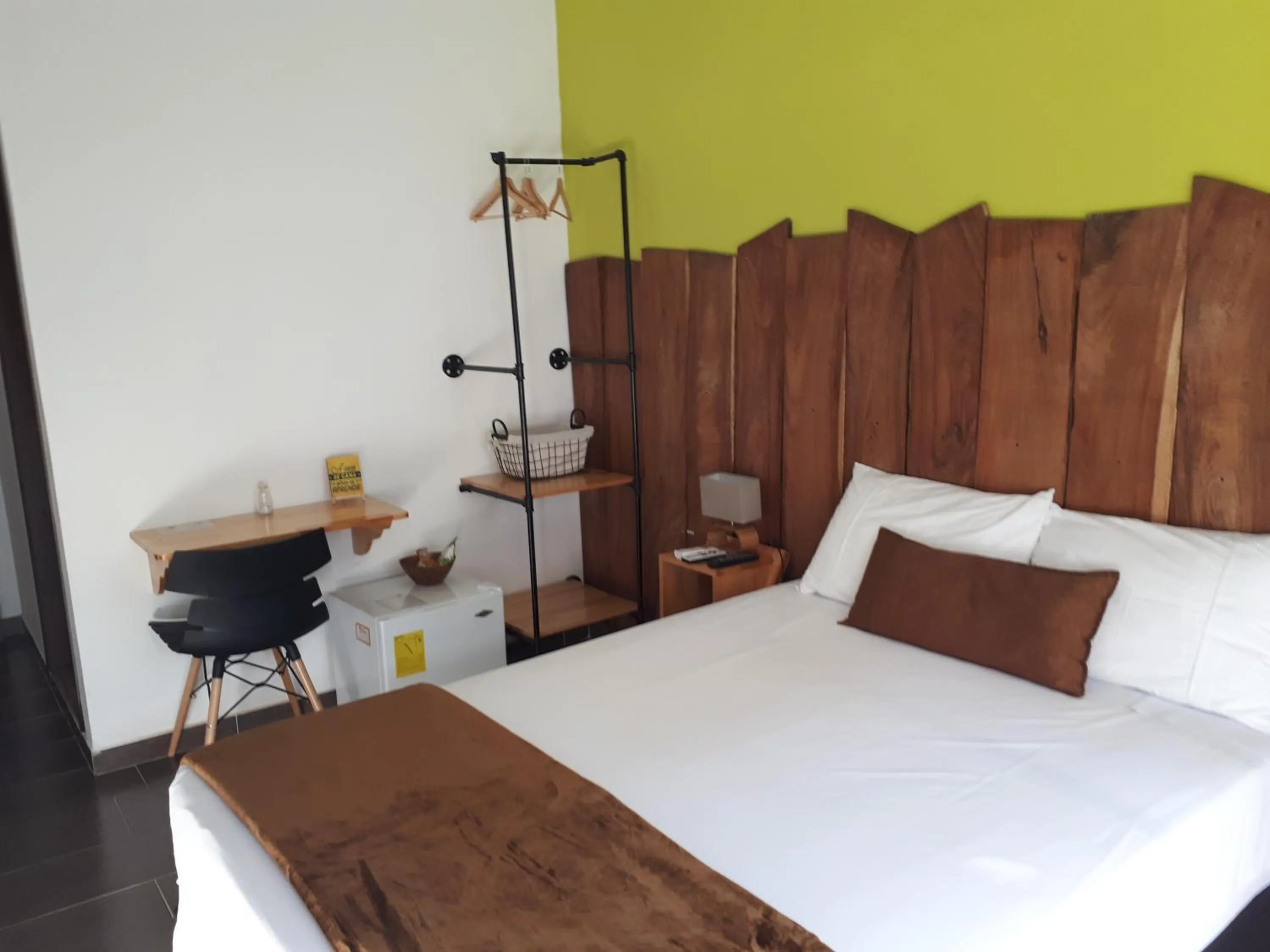 Bed in Rivière Boutique Hotel