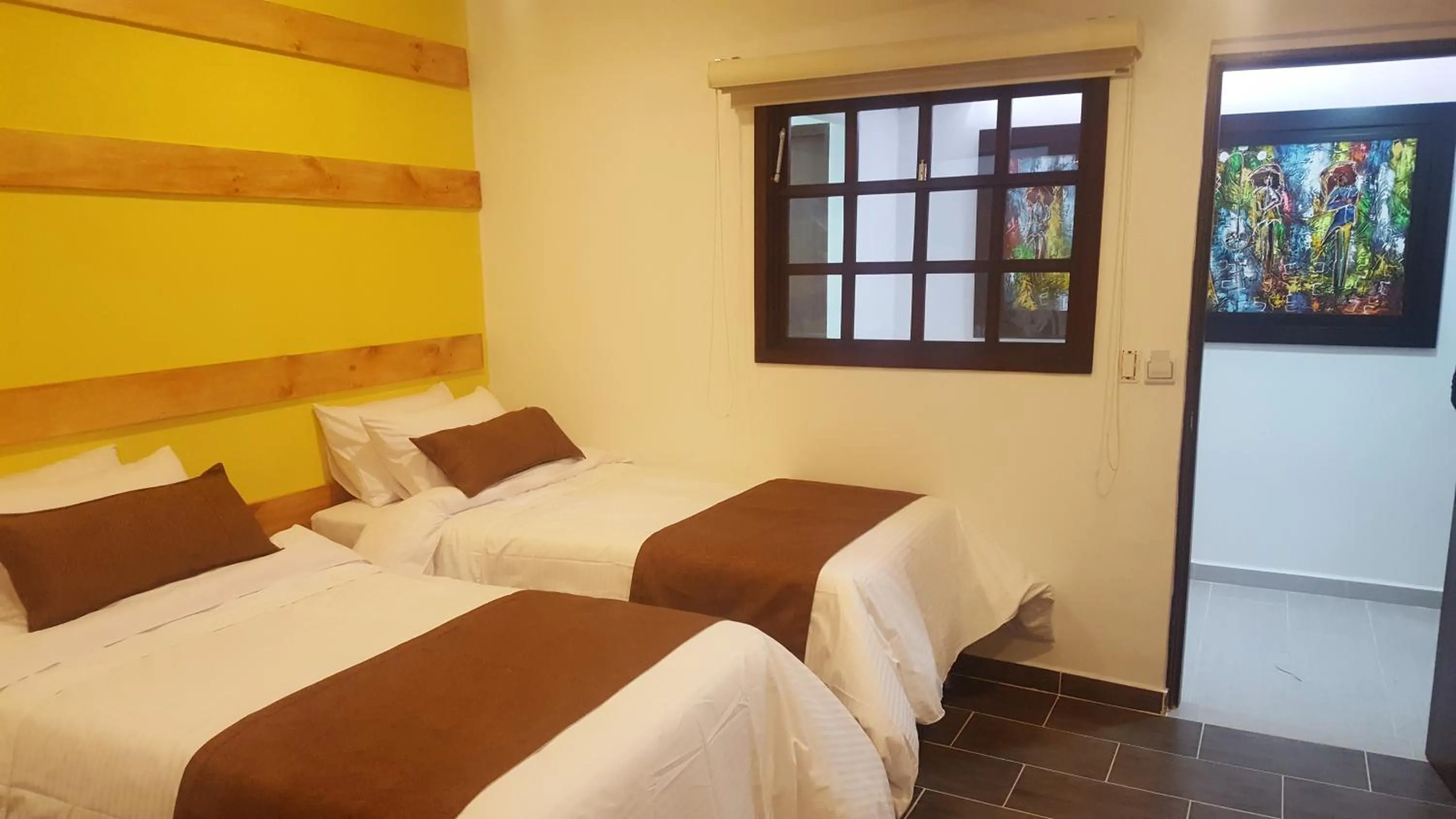 Bed in Rivière Boutique Hotel