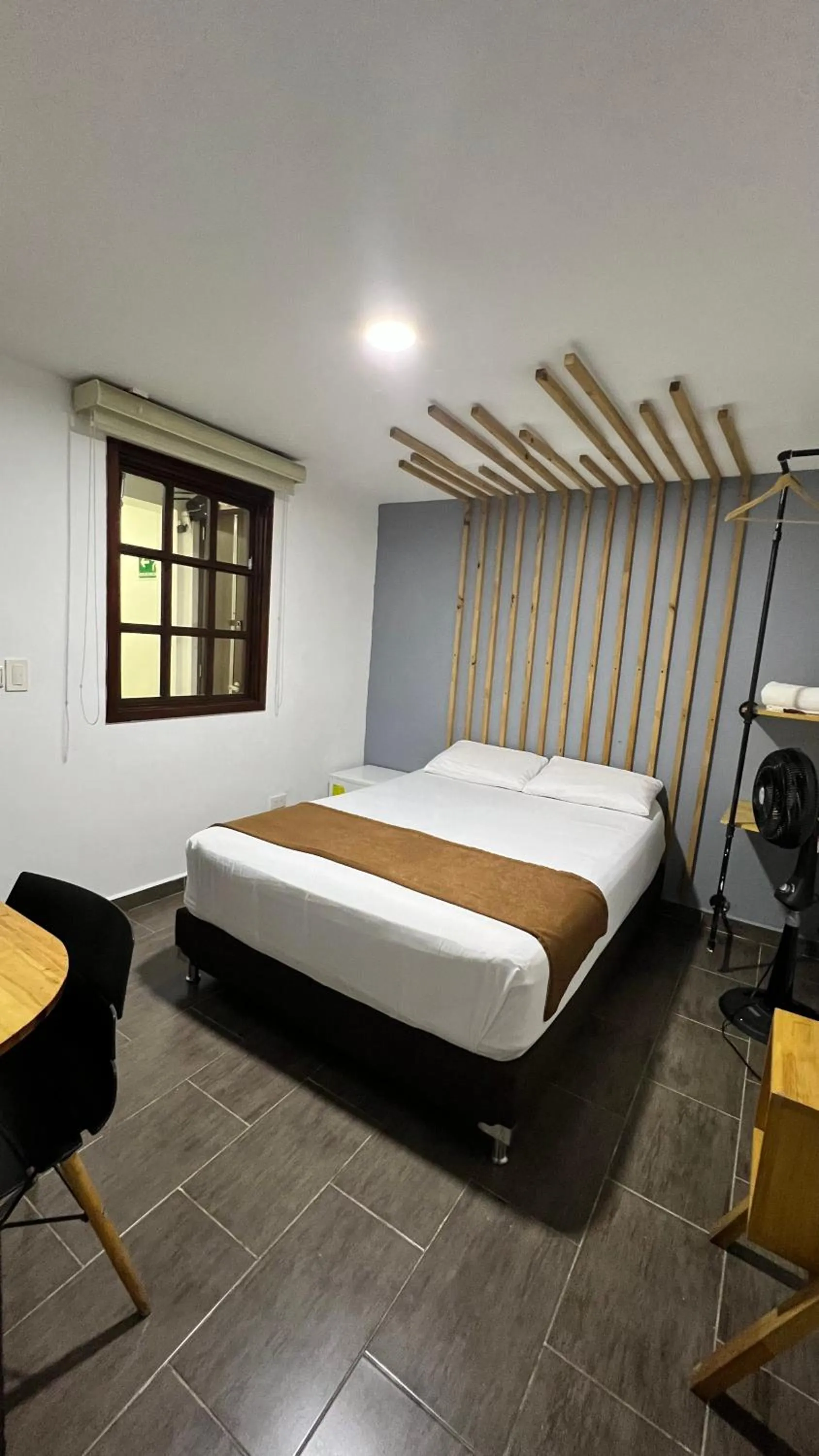 Bed in Rivière Boutique Hotel