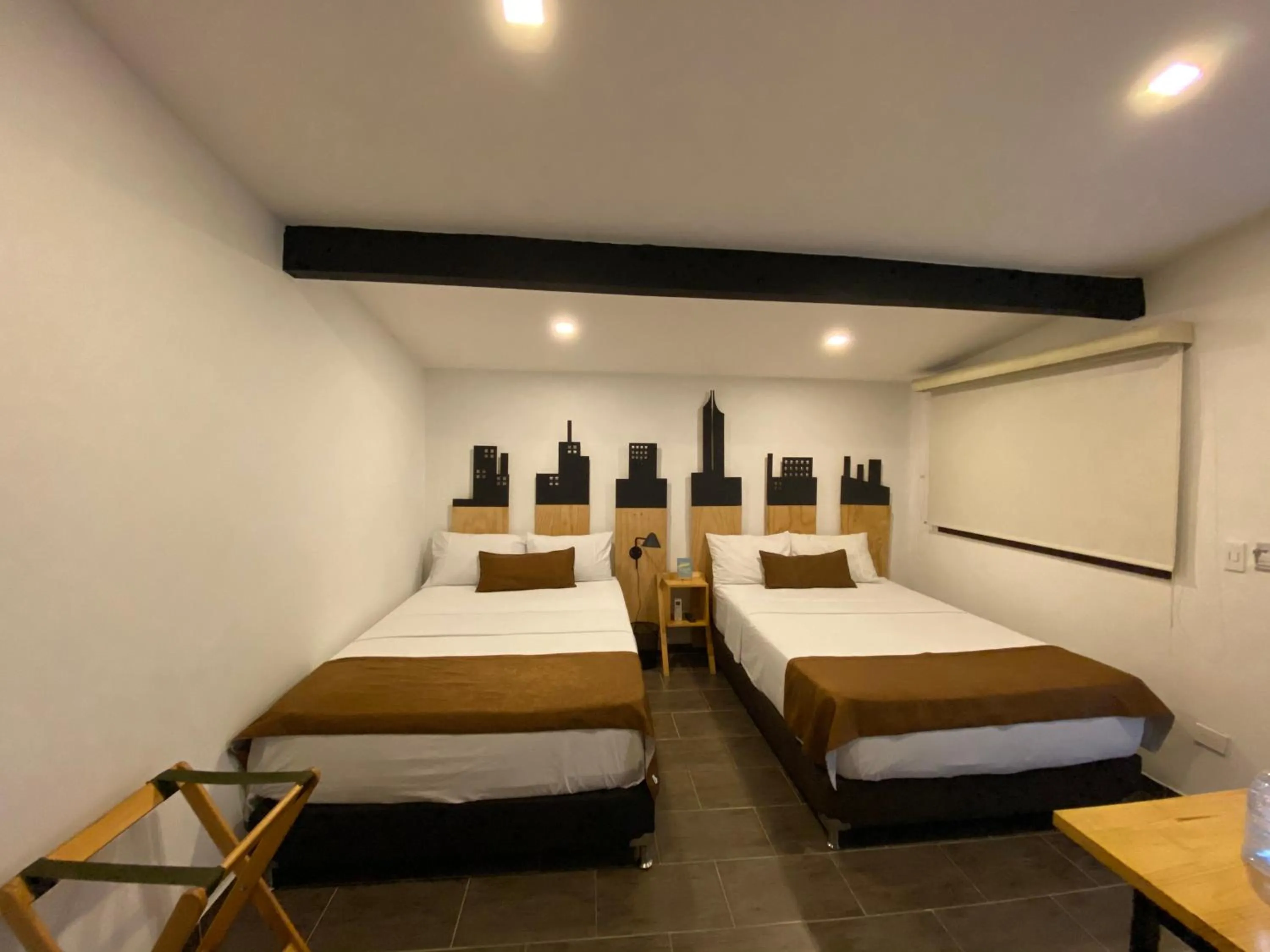 Bed in Rivière Boutique Hotel