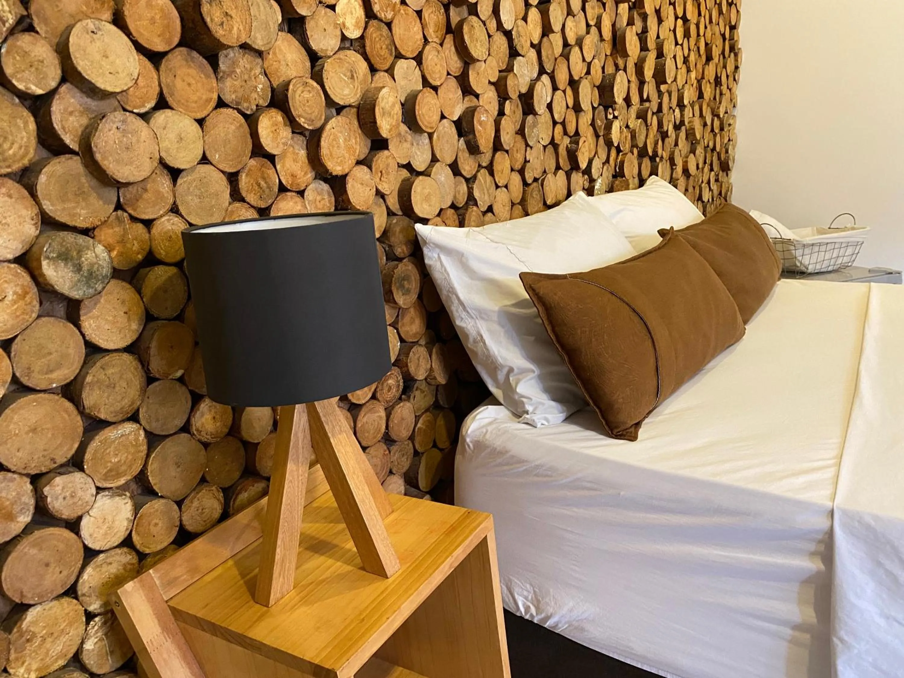 Bed in Rivière Boutique Hotel