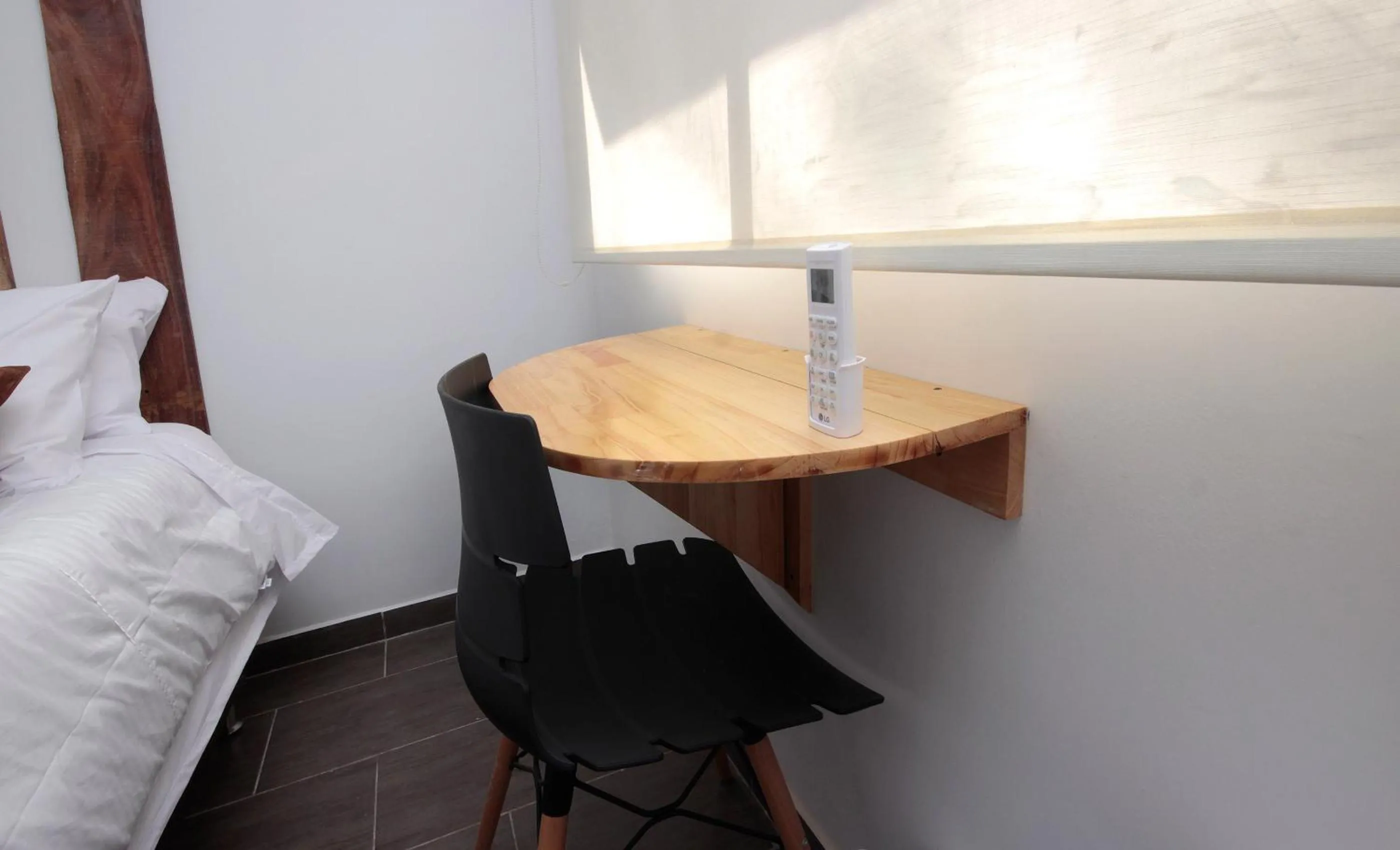 Seating area, Bed in Rivière Boutique Hotel