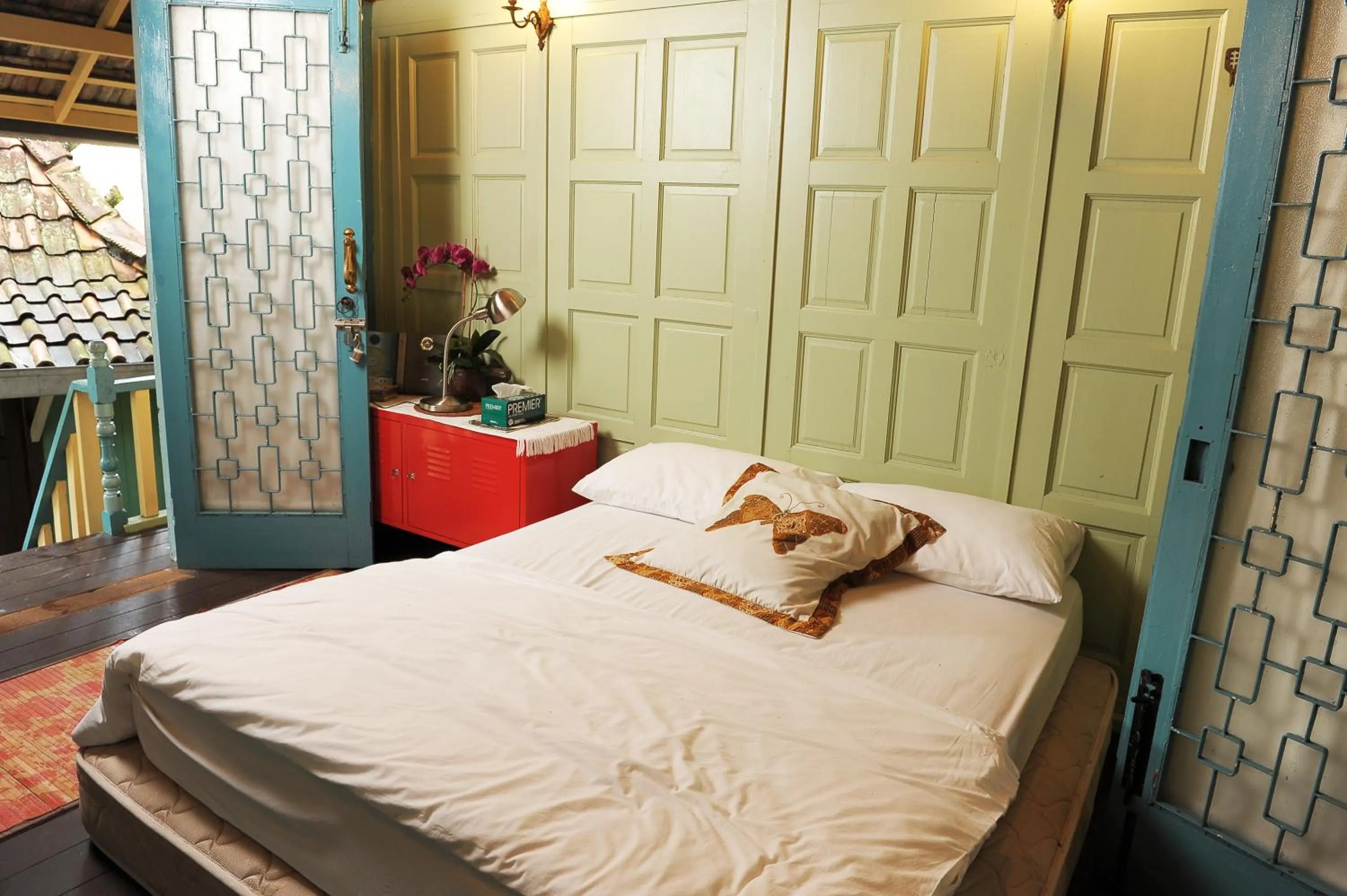 Photo of the whole room, Bed in Classic Malay House in KL City Centre