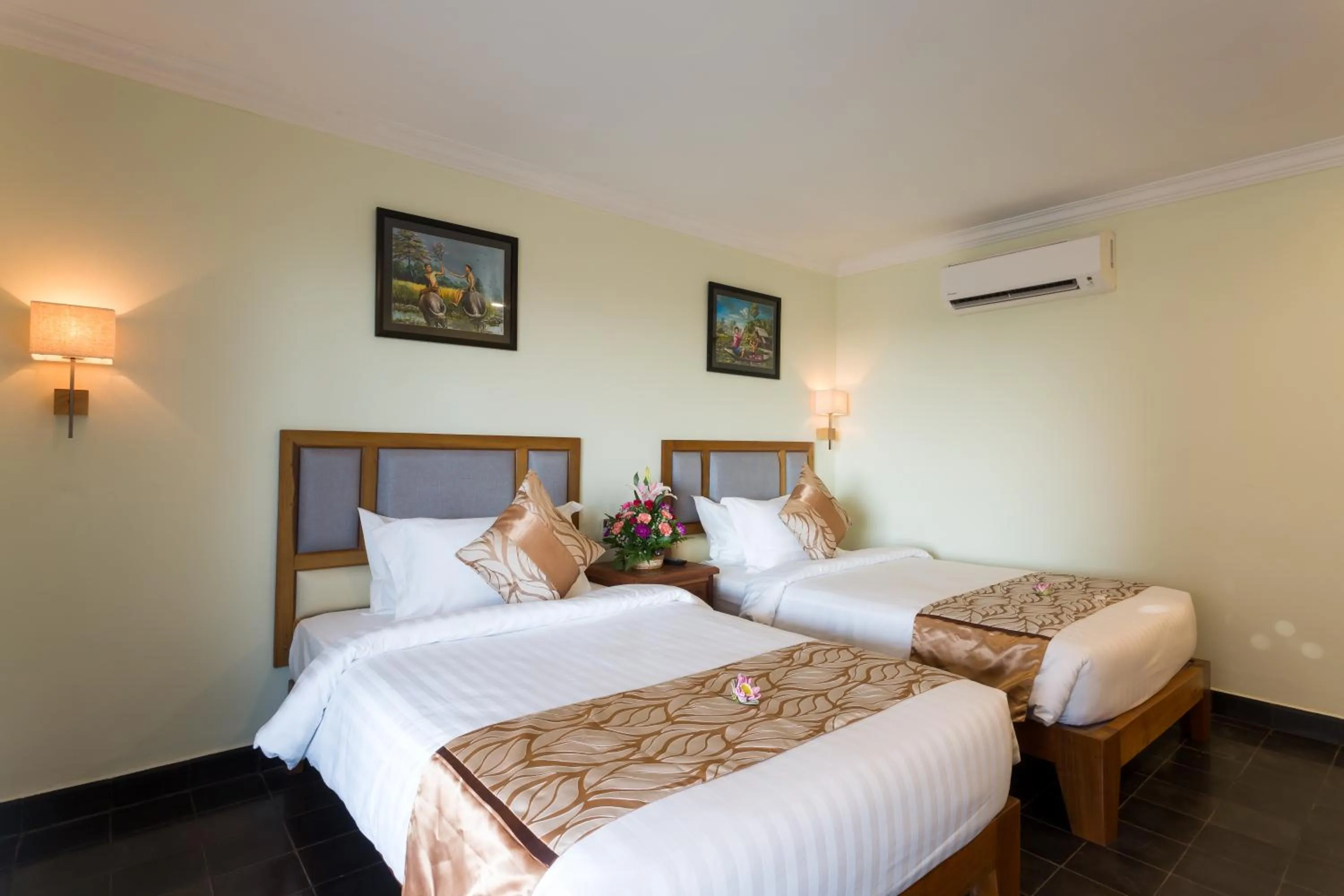 Bed in Grand Bayon Siem Reap Hotel