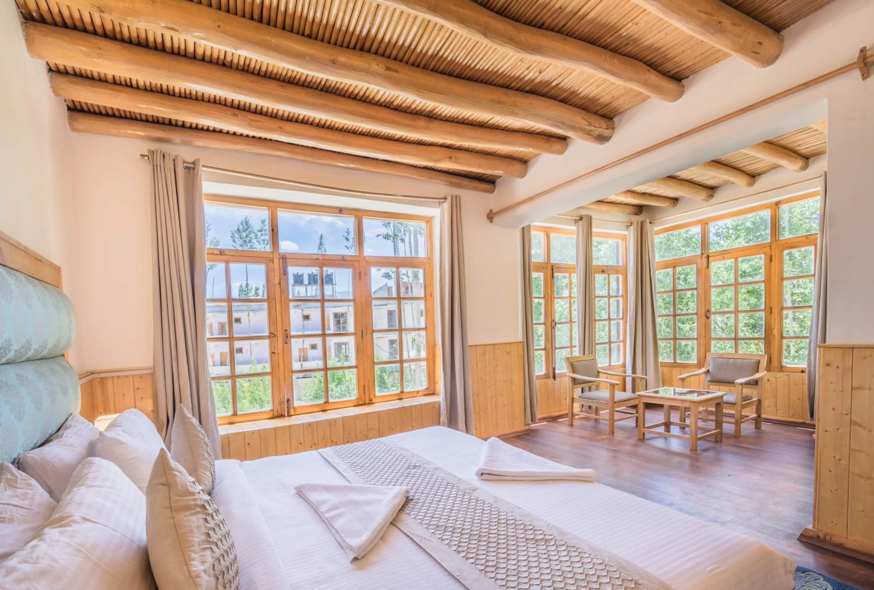 Seating area, Bed in The Silk Route Ladakh