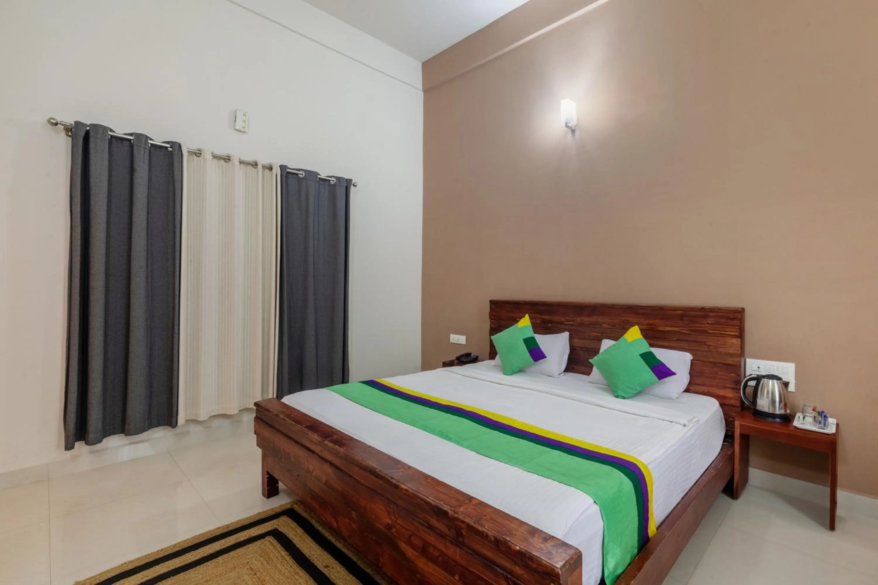 Bedroom, Bed in Treebo Vrindavan, 3 Km From Madikeri Fort