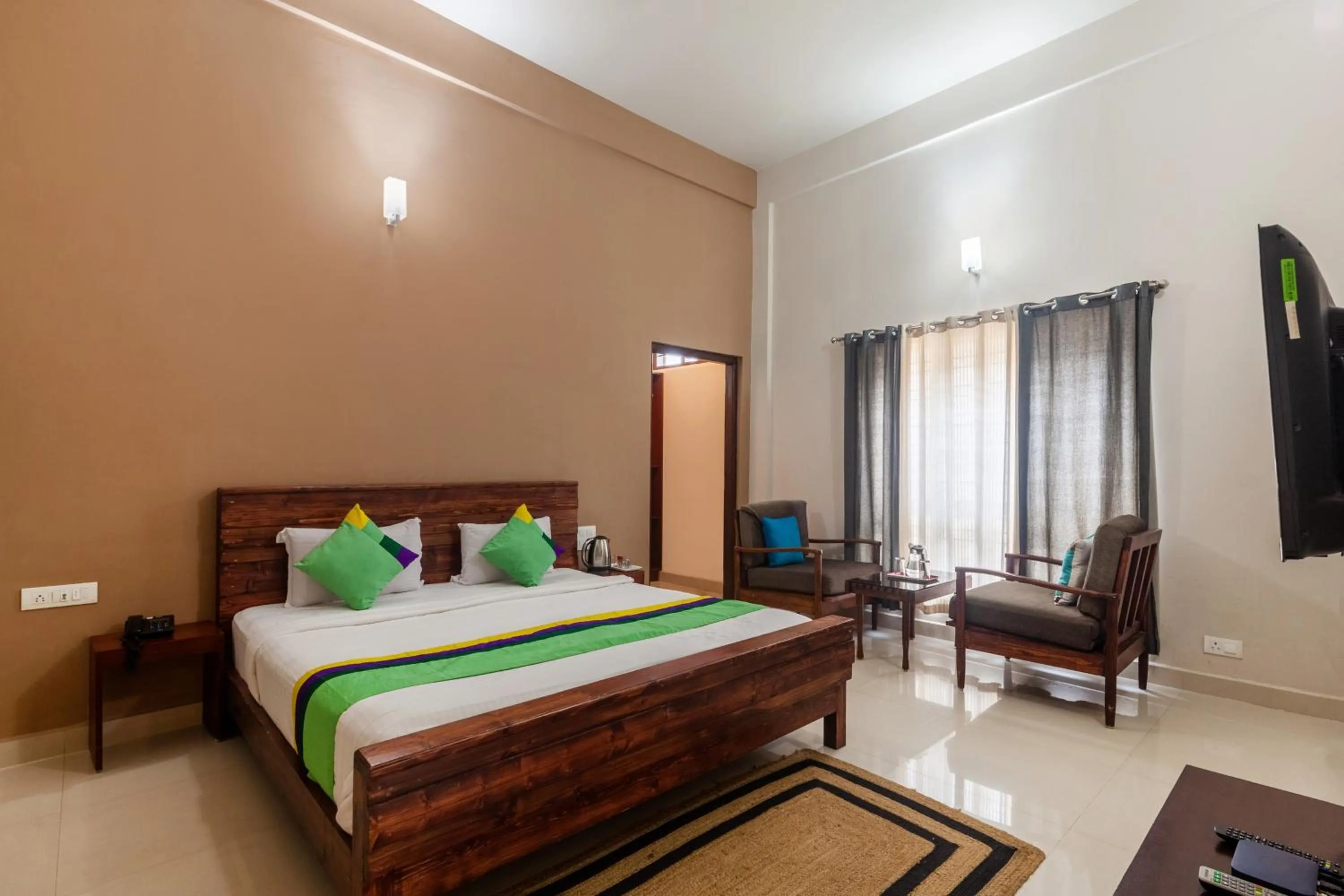 Bedroom, Bed in Treebo Vrindavan, 3 Km From Madikeri Fort