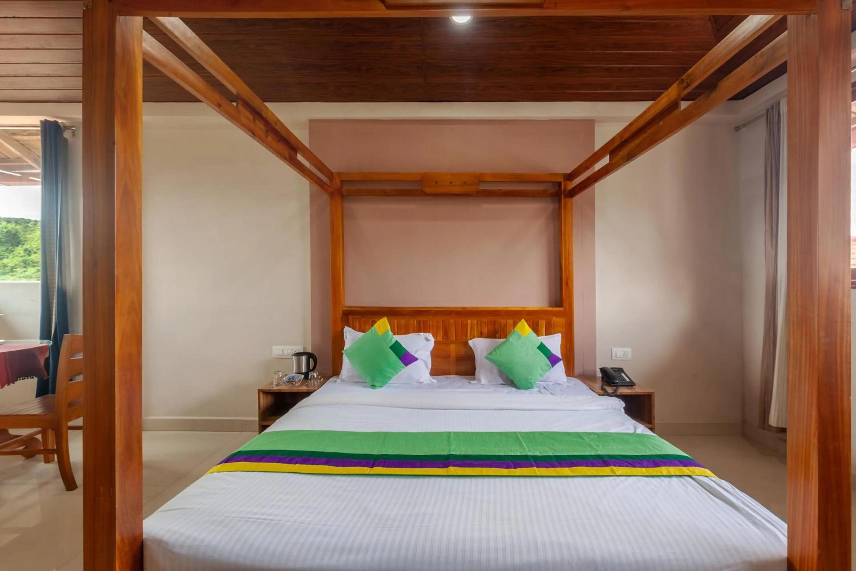 Bedroom, Bed in Treebo Vrindavan, 3 Km From Madikeri Fort