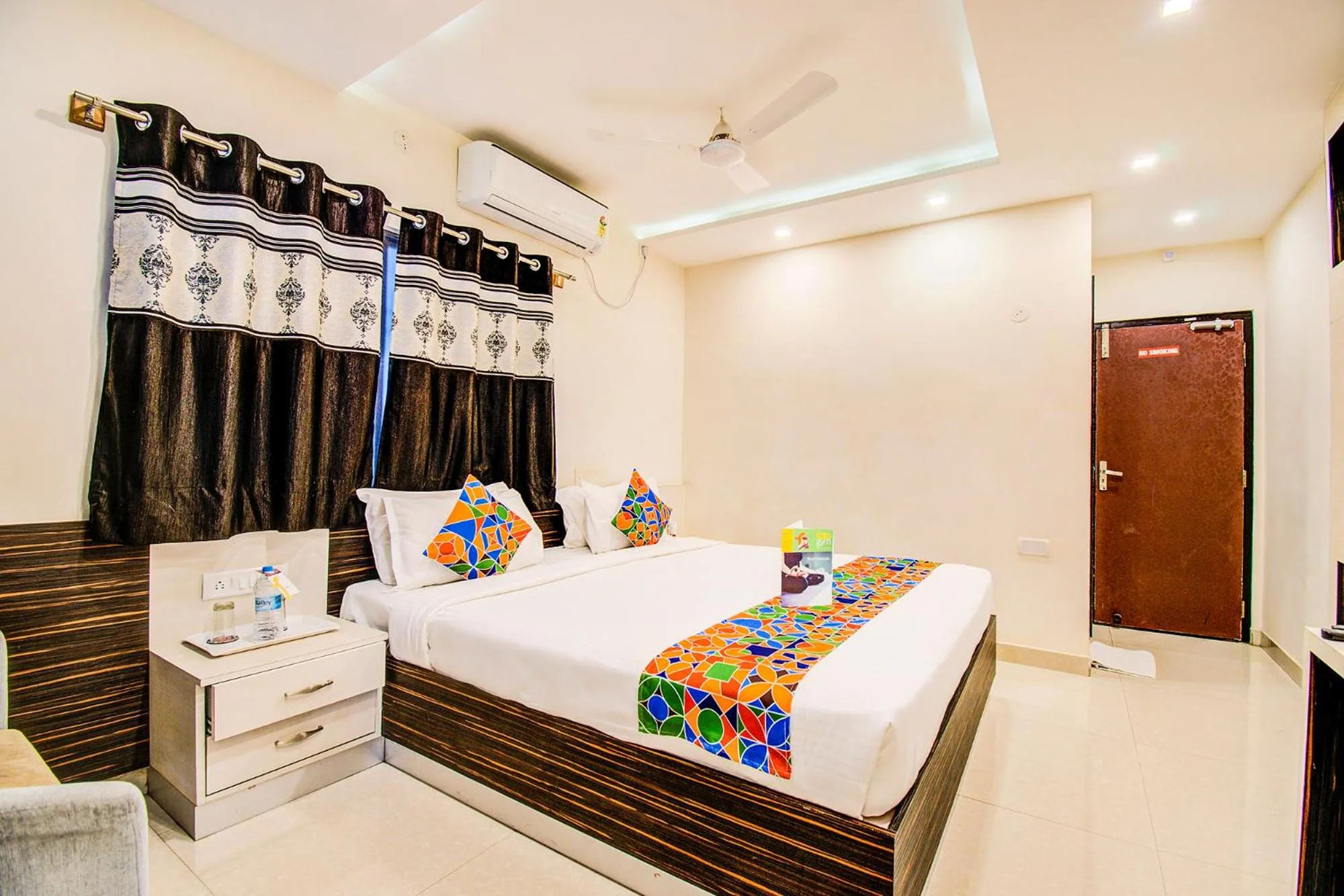 Bed in FabHotel Corporate Crown - Nr Jyoti Nivas University