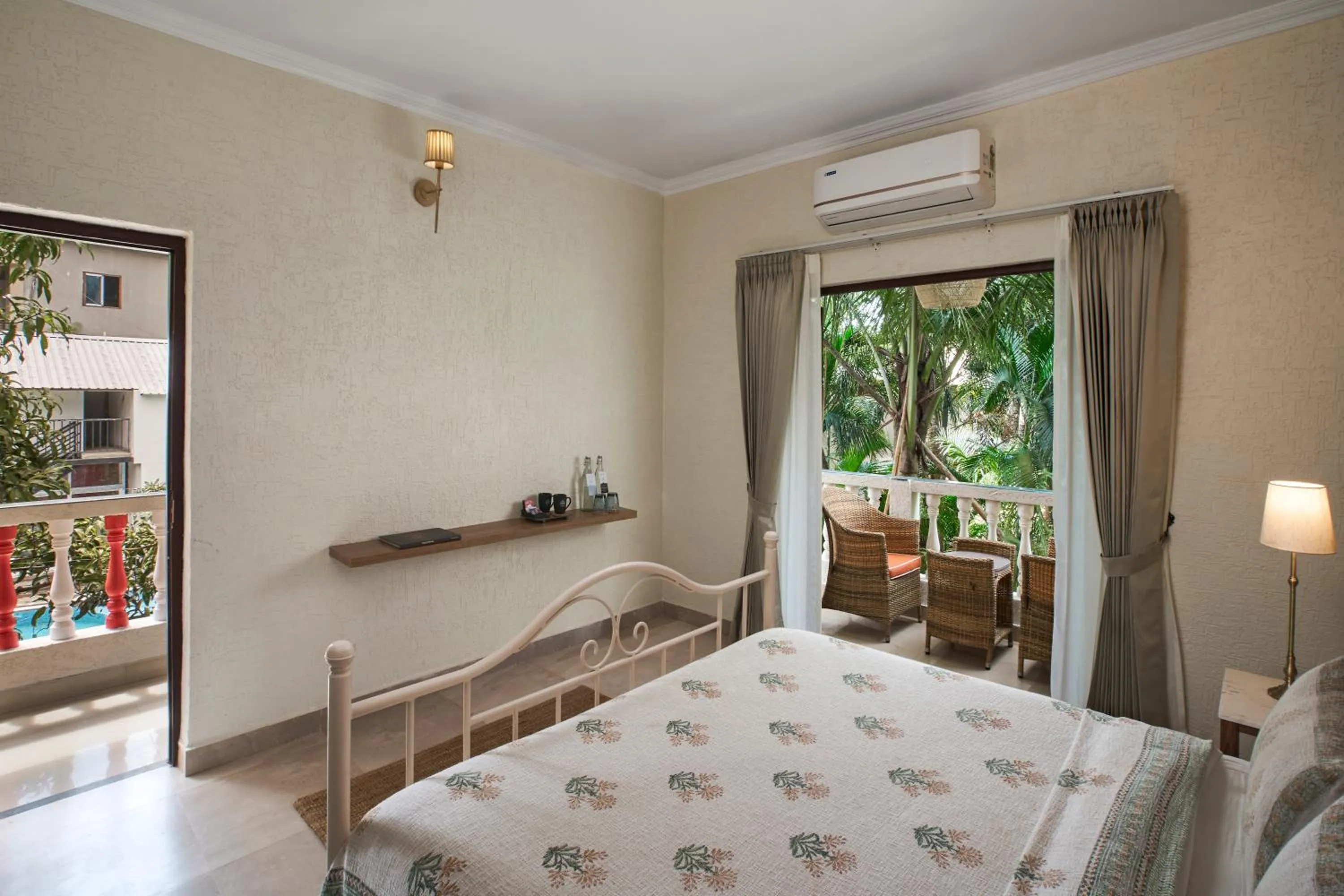 Seating area, Bed in LaRiSa Resort, Morjim