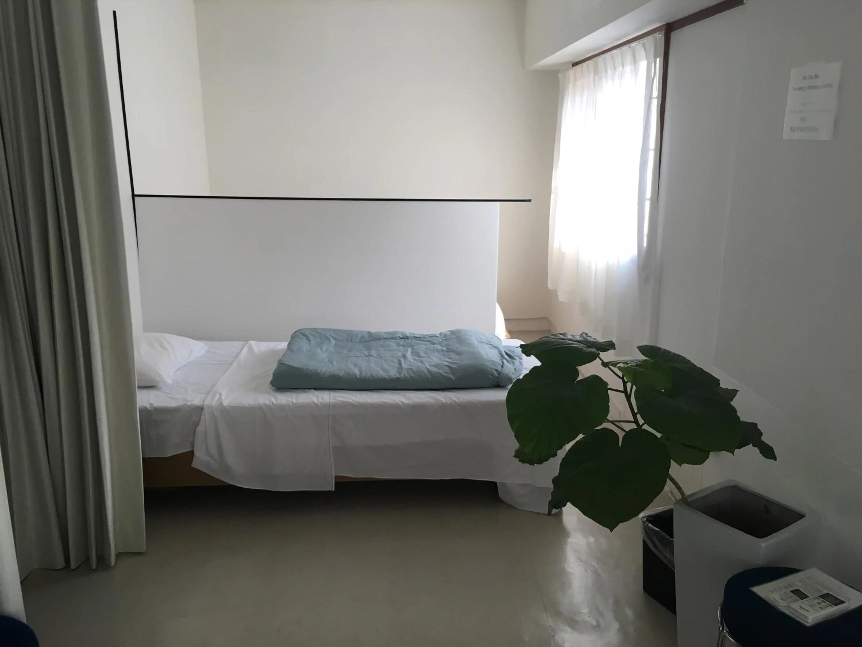Bed in Guest House M104 Kagoshima