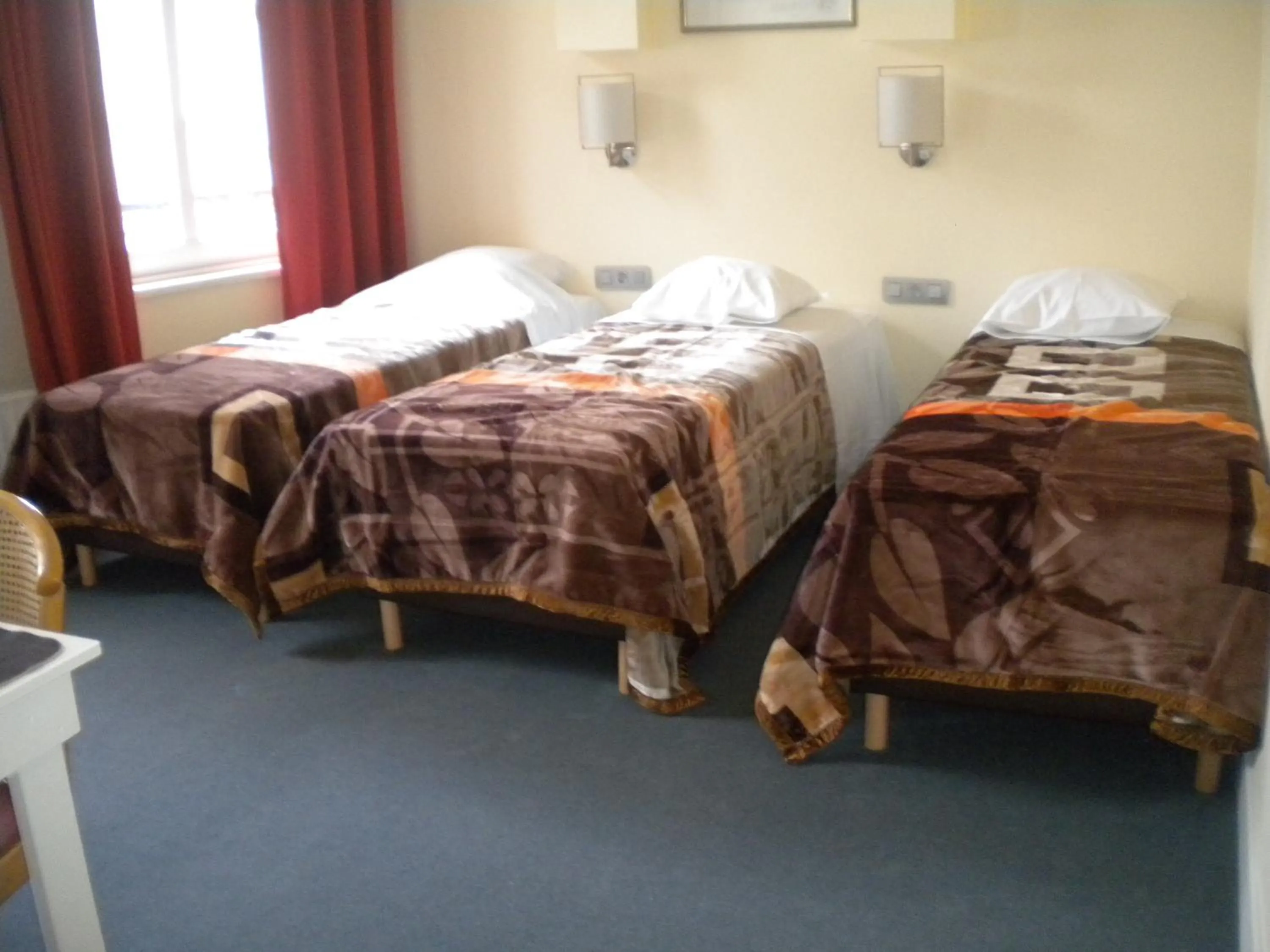 Bed in Hotel Queen Mary