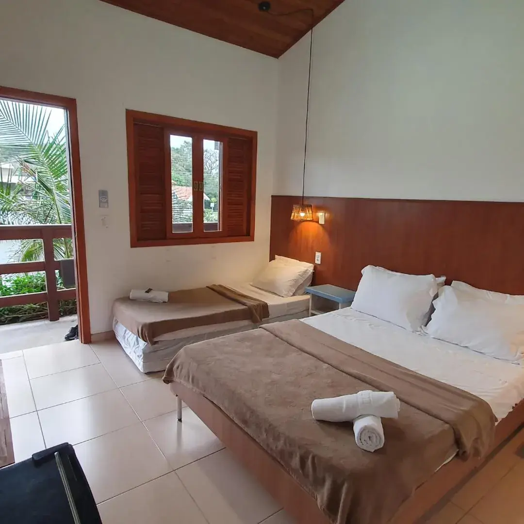 Economy Triple Room in Pousada Lagoa do Rosa Economy Triple Room in Pousada Lagoa do Rosa