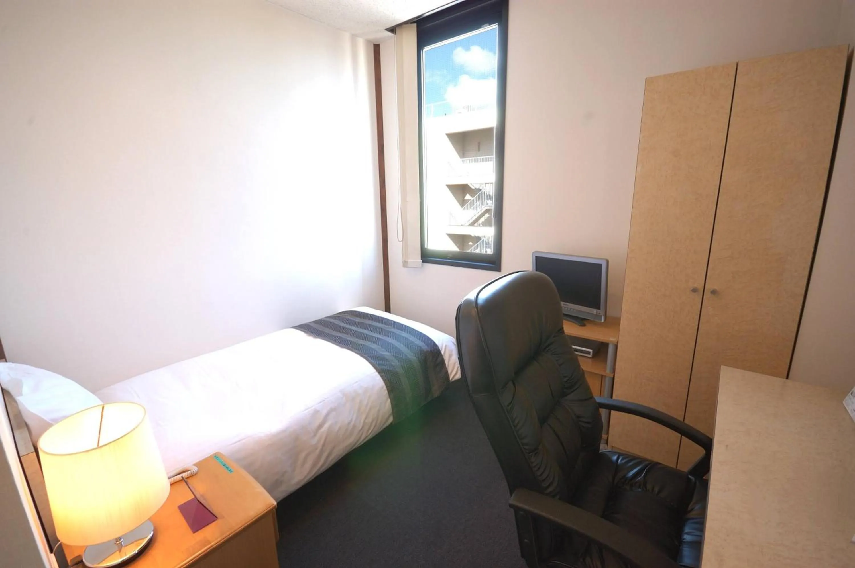 Bed in ArC LIFESTYLE SPACE & HOTEL