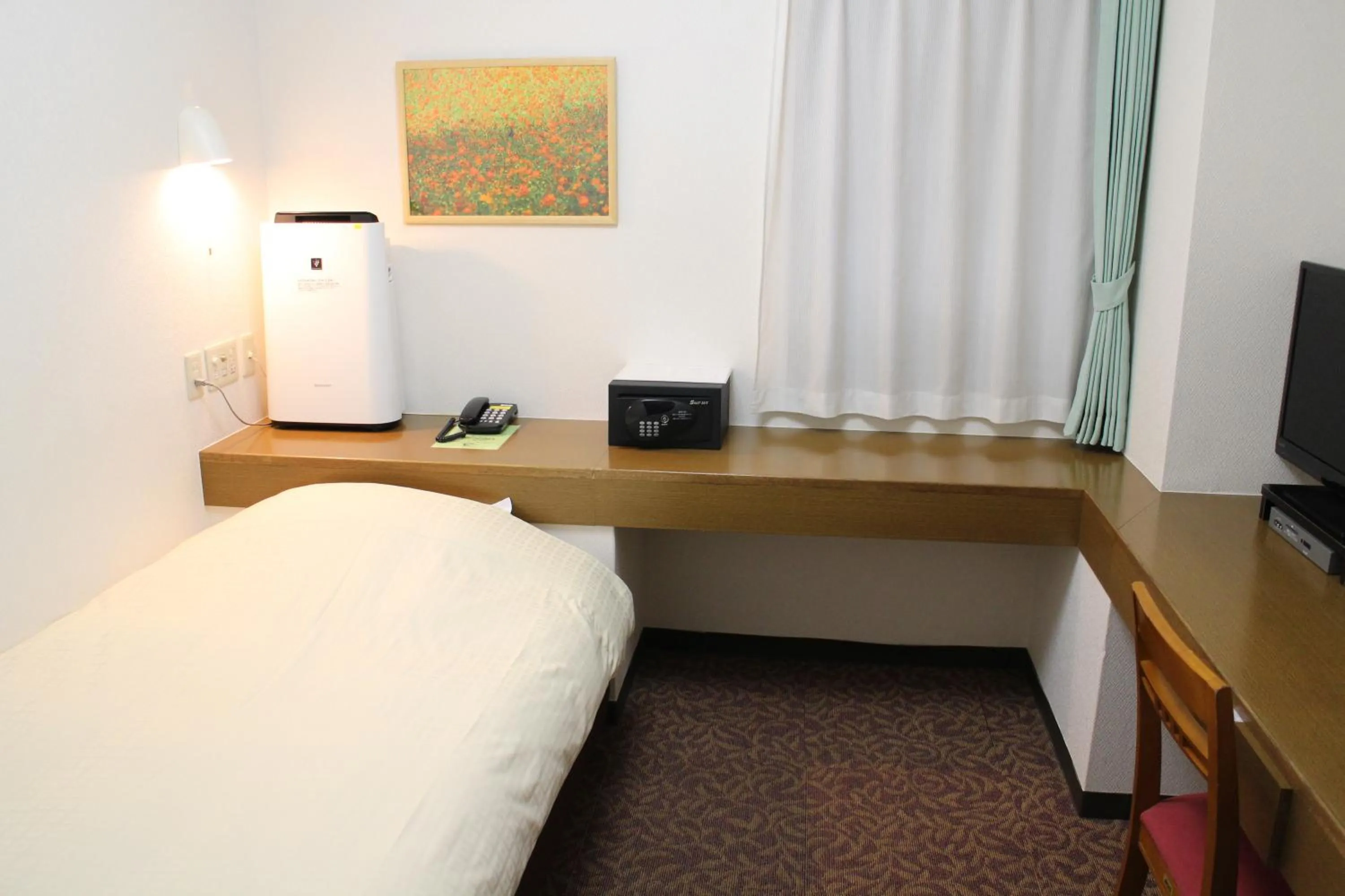 Photo of the whole room, Bed in Business Hotel Raicho