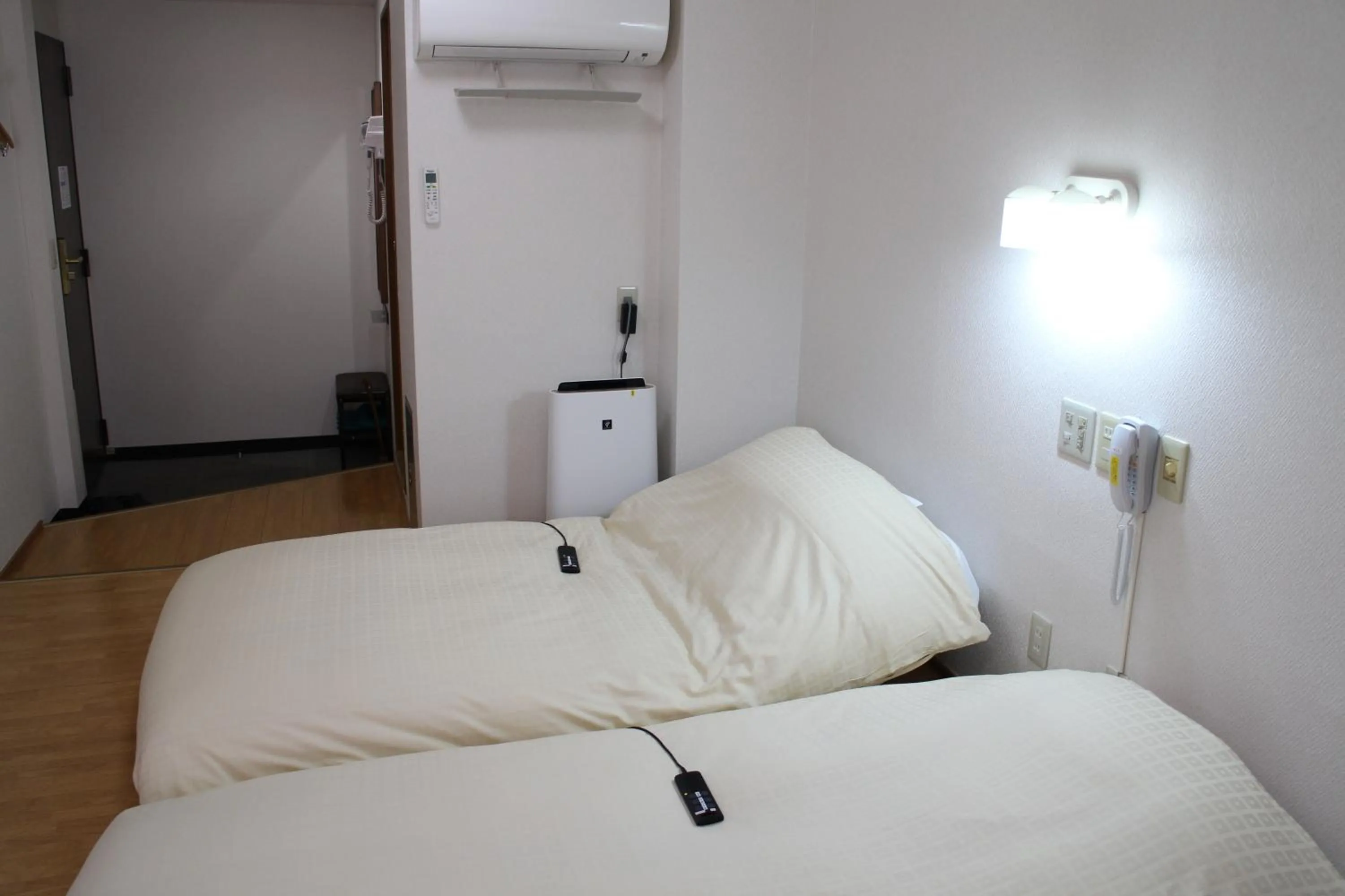 Bed in Business Hotel Raicho