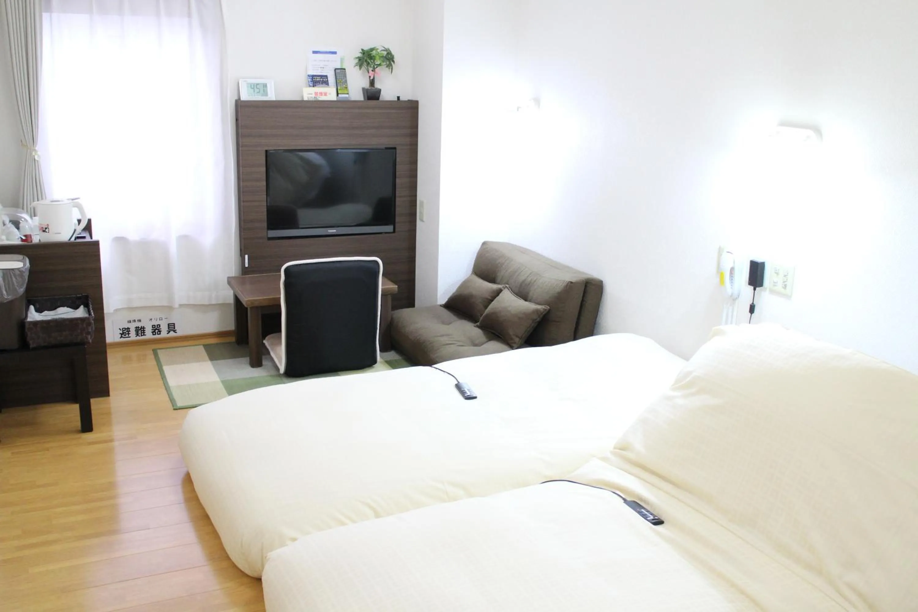 Photo of the whole room, Bed in Business Hotel Raicho