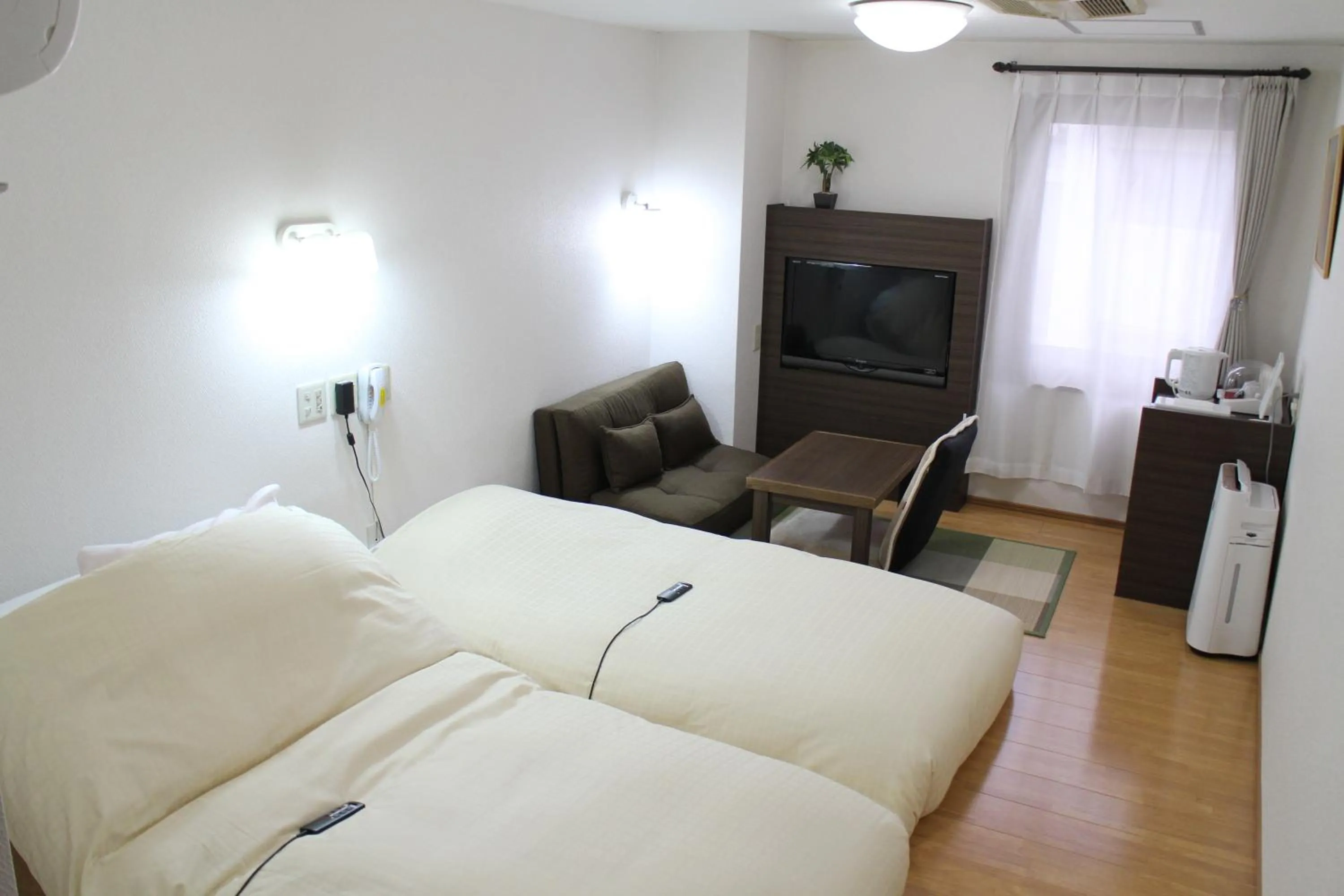 Photo of the whole room, Bed in Business Hotel Raicho