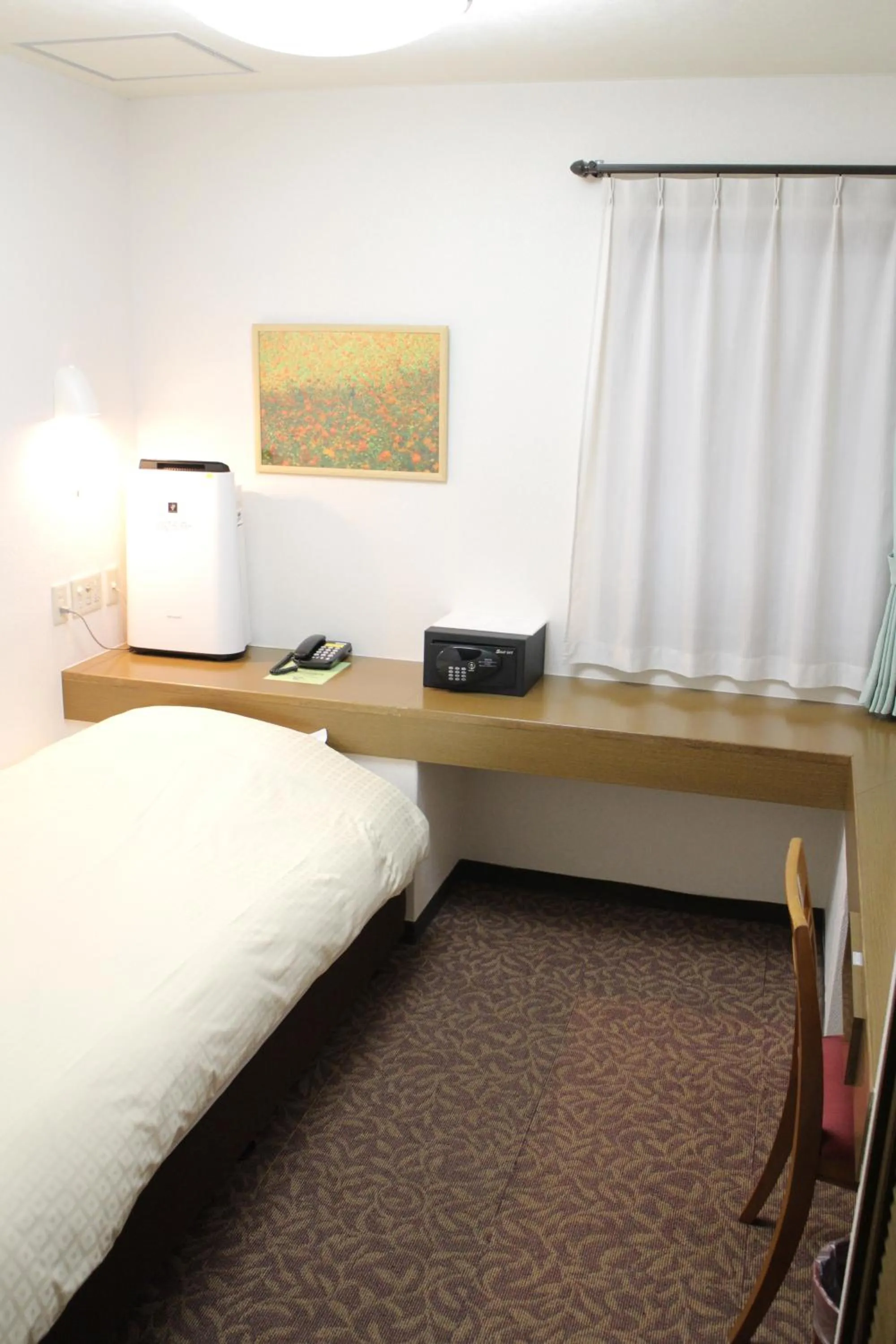 Photo of the whole room, Bed in Business Hotel Raicho