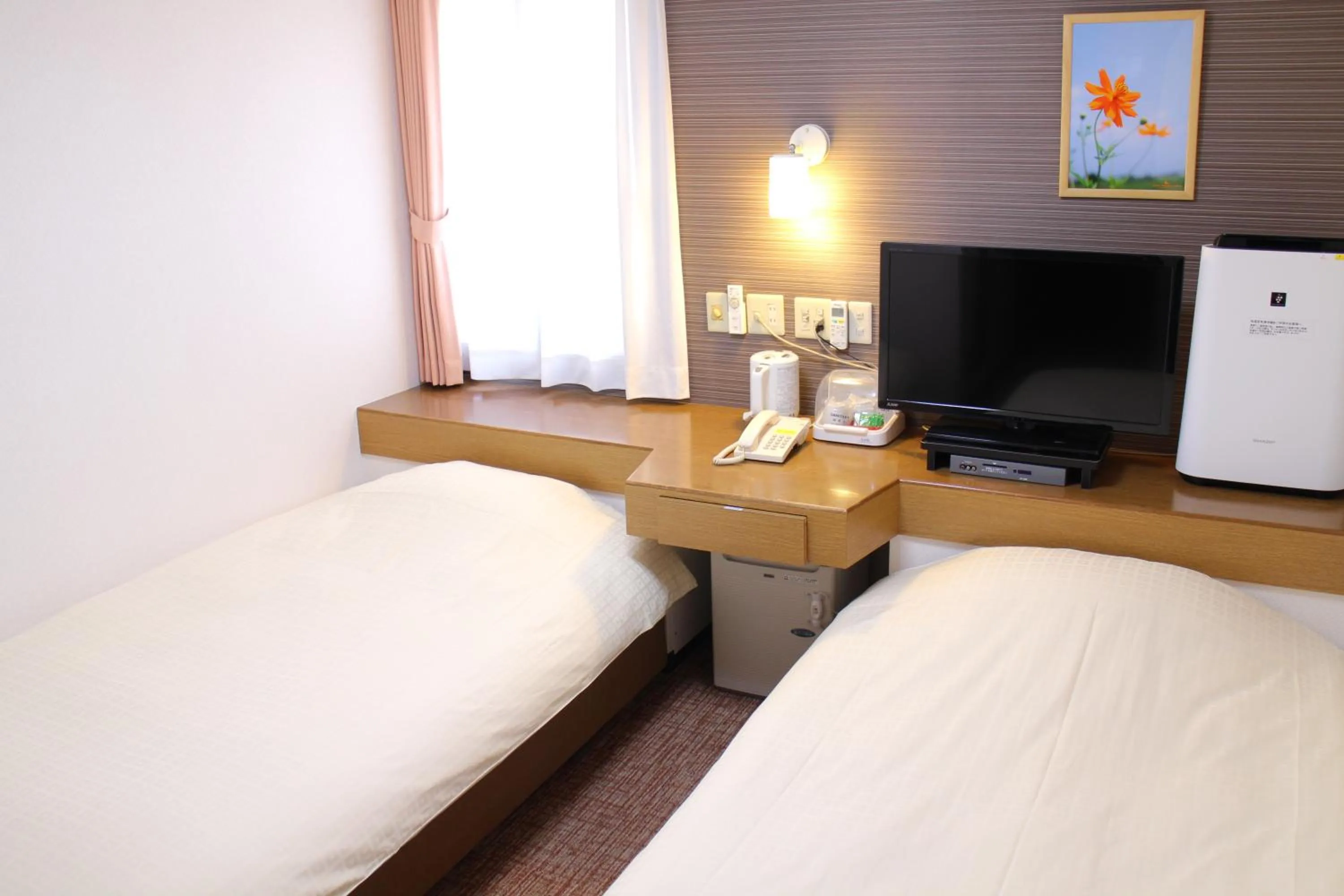 Photo of the whole room, Bed in Business Hotel Raicho