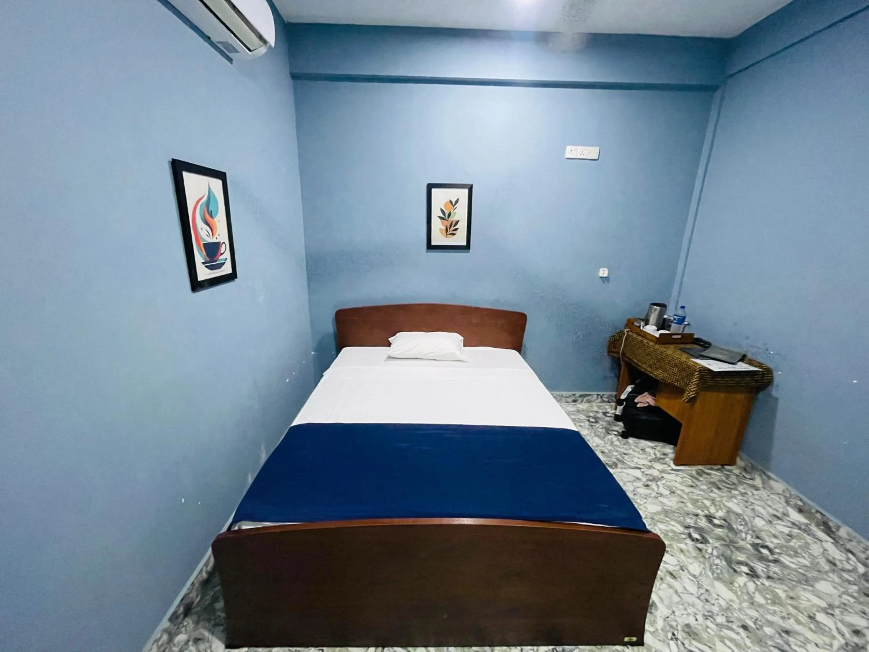 Bed in Nilaveli Hybrid Holiday Hotel