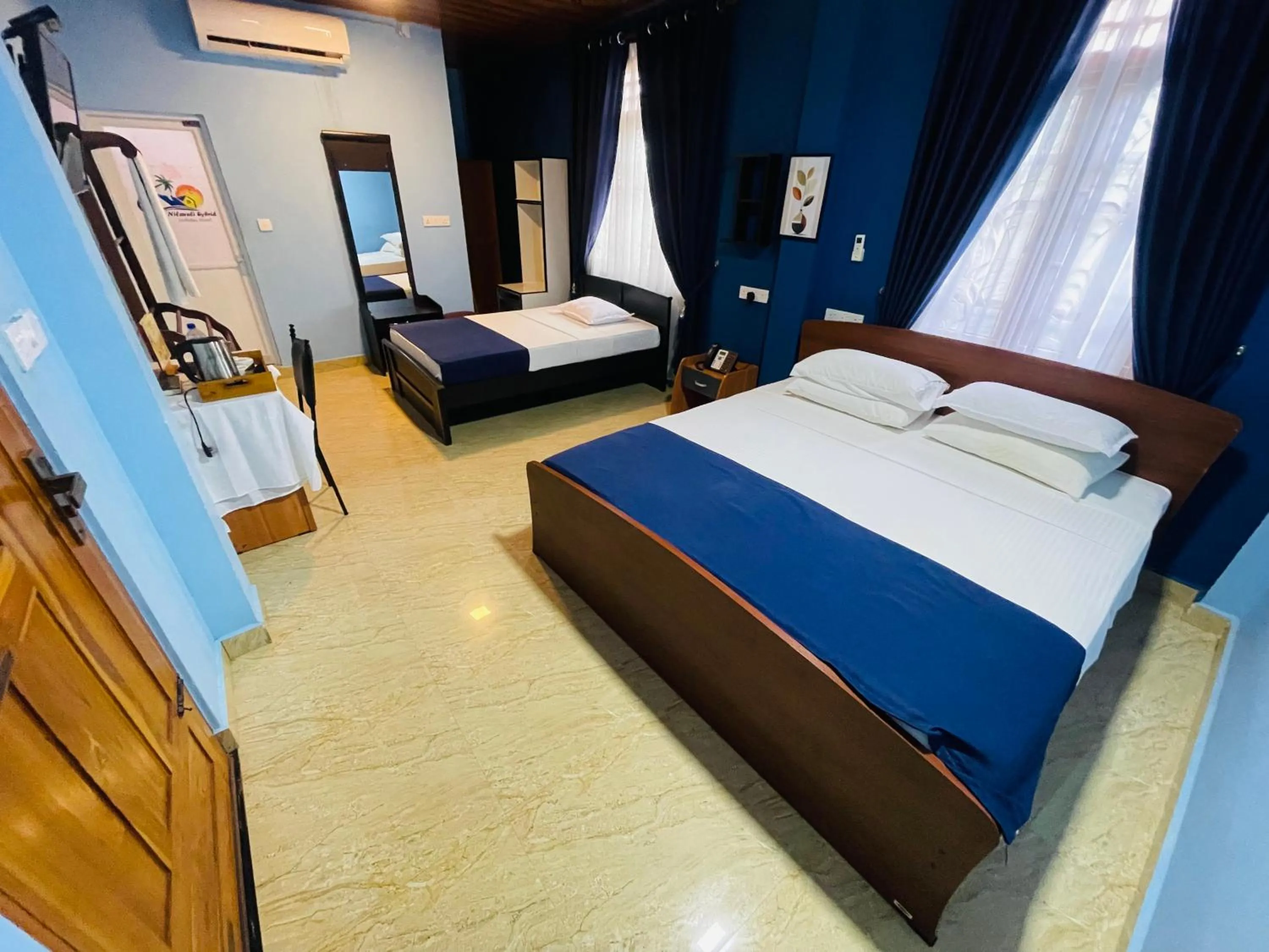 Bed in Nilaveli Hybrid Holiday Hotel