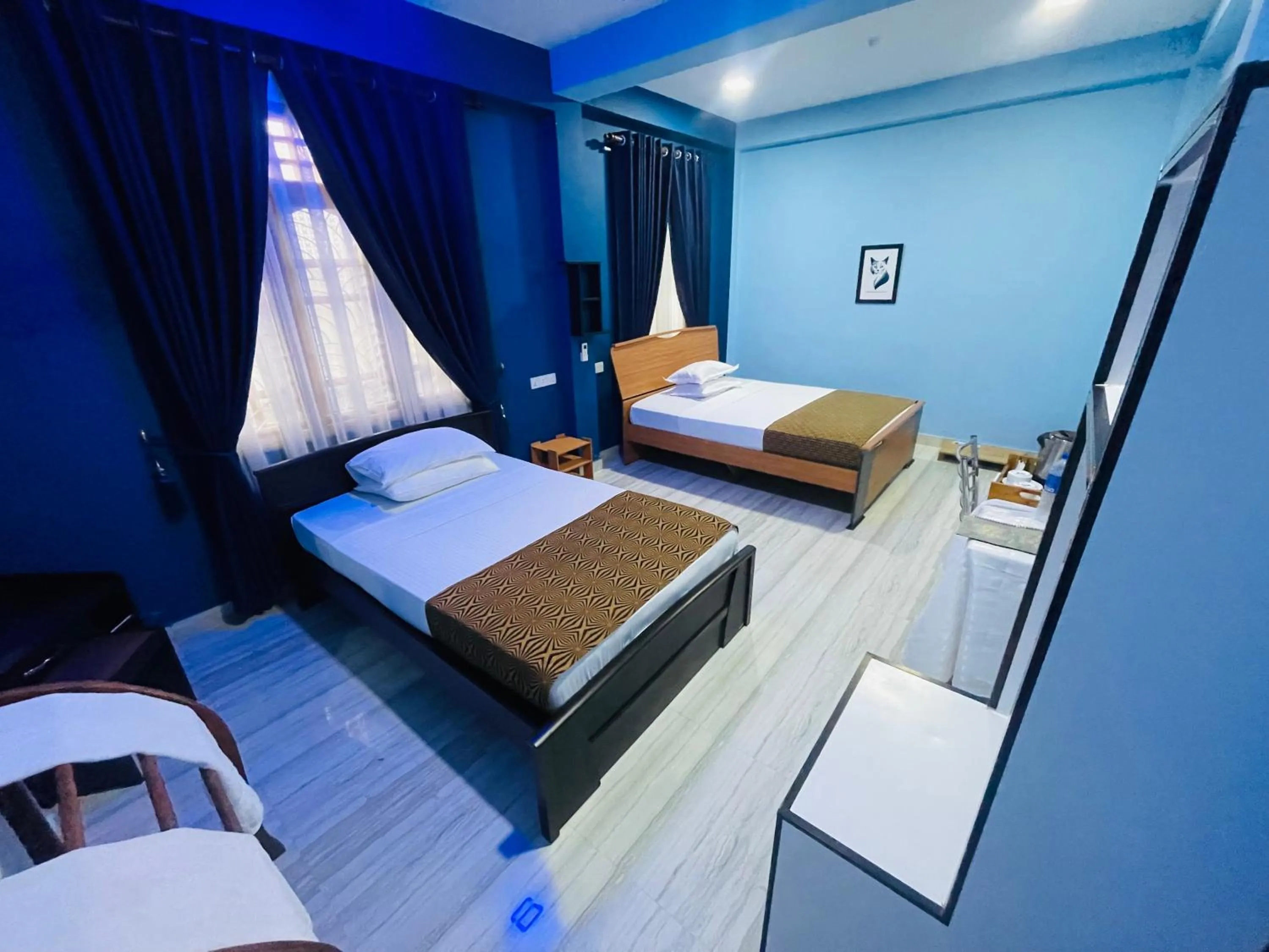 Bed in Nilaveli Hybrid Holiday Hotel