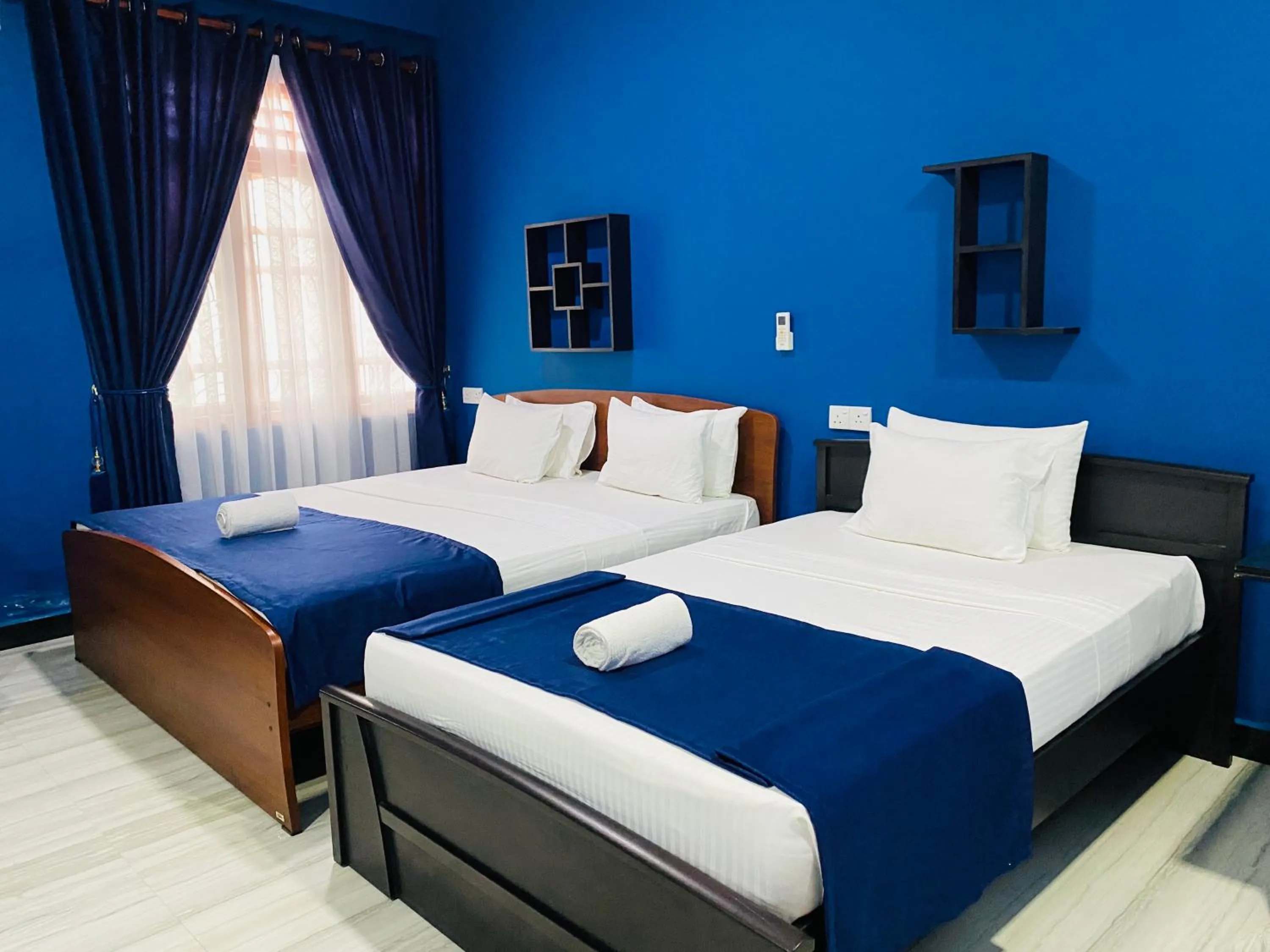 Bed in Nilaveli Hybrid Holiday Hotel