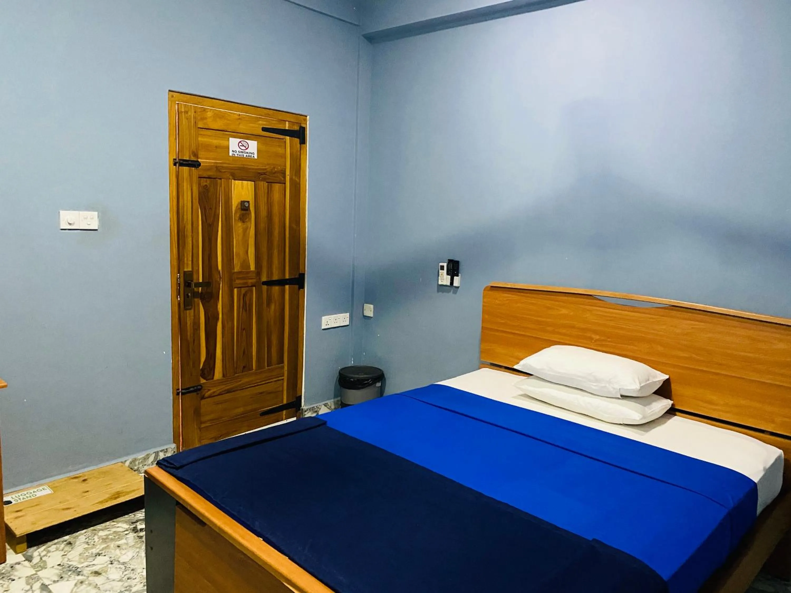 Bed in Nilaveli Hybrid Holiday Hotel