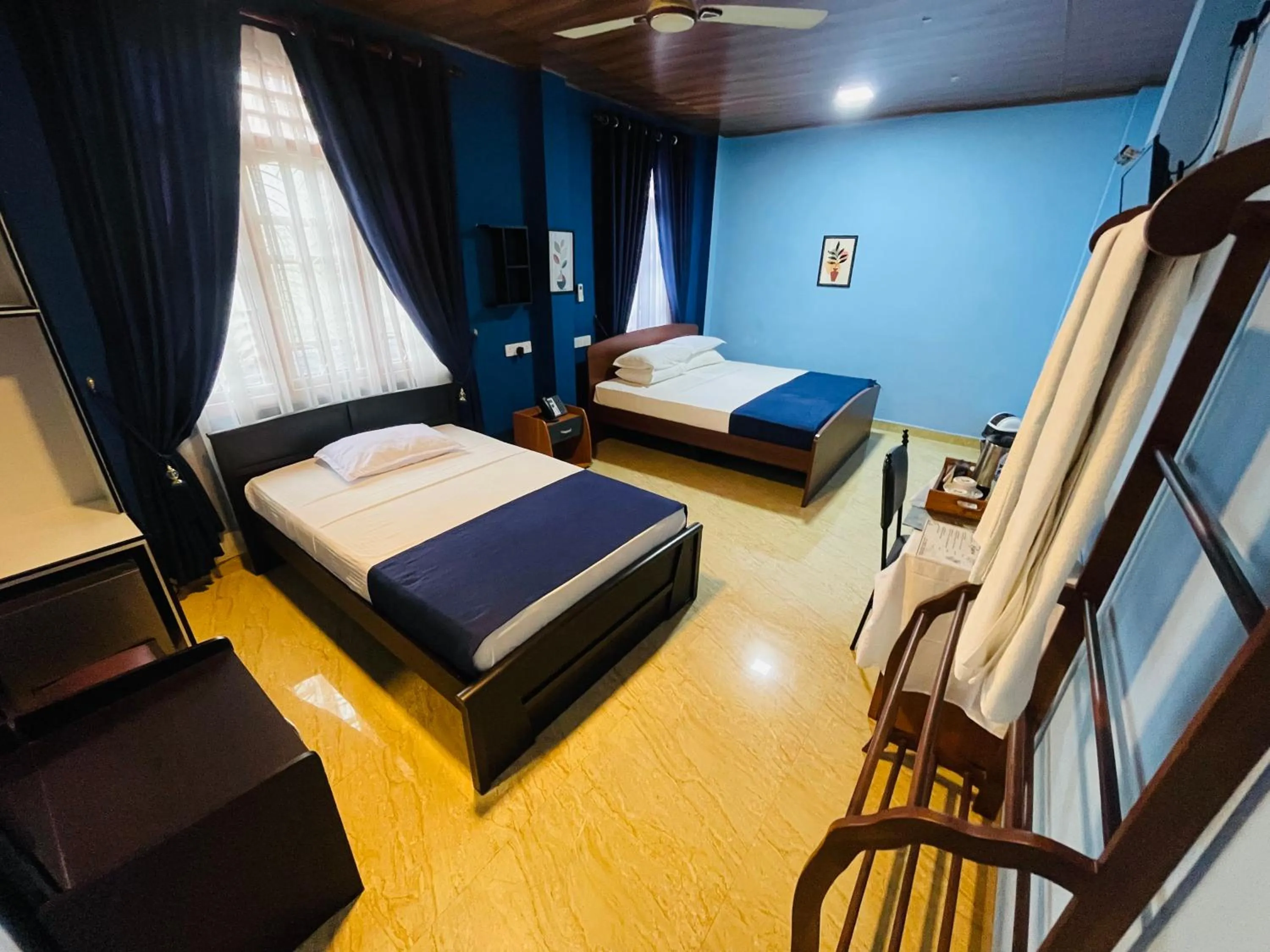 Bed in Nilaveli Hybrid Holiday Hotel