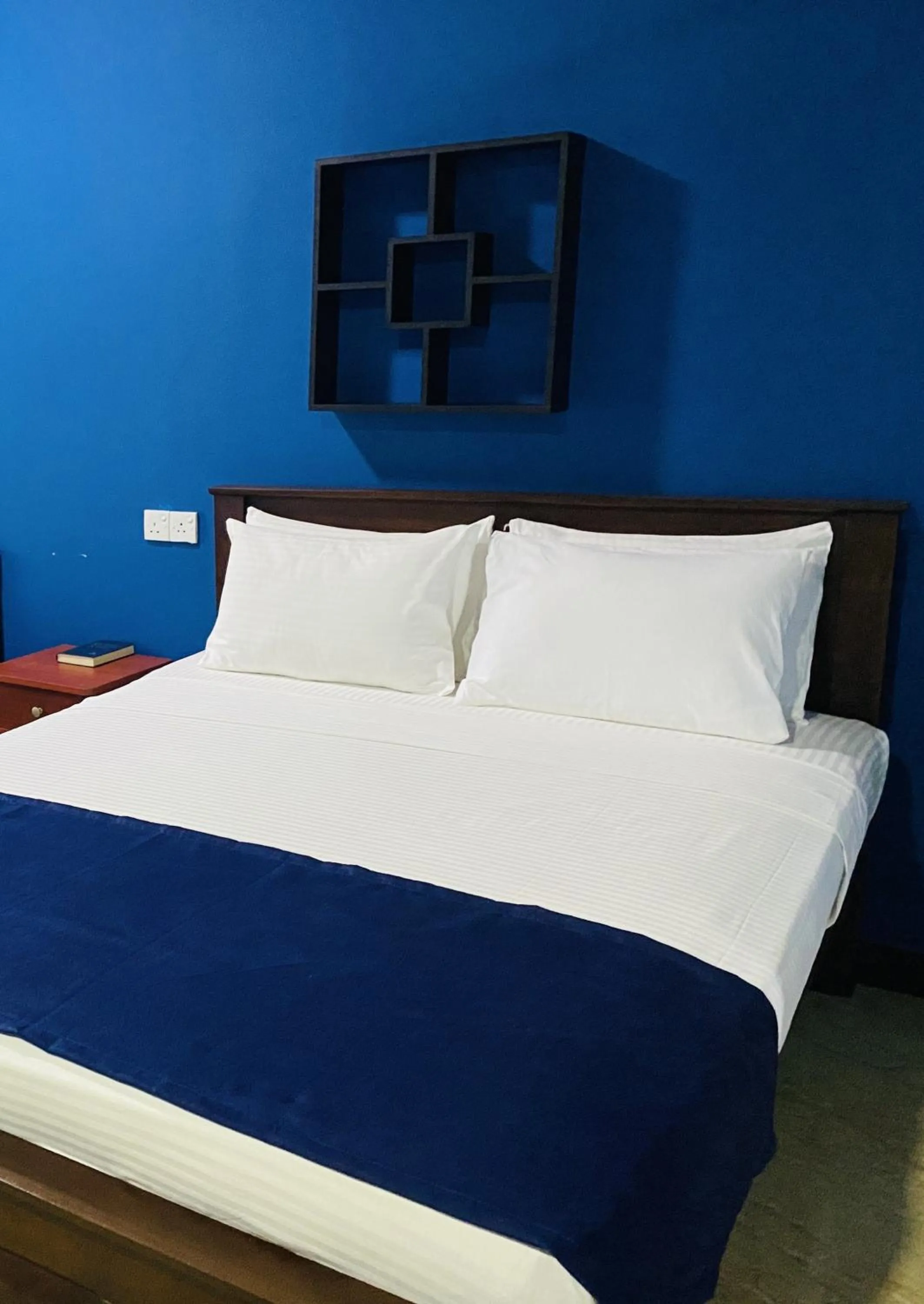 Bed in Nilaveli Hybrid Holiday Hotel