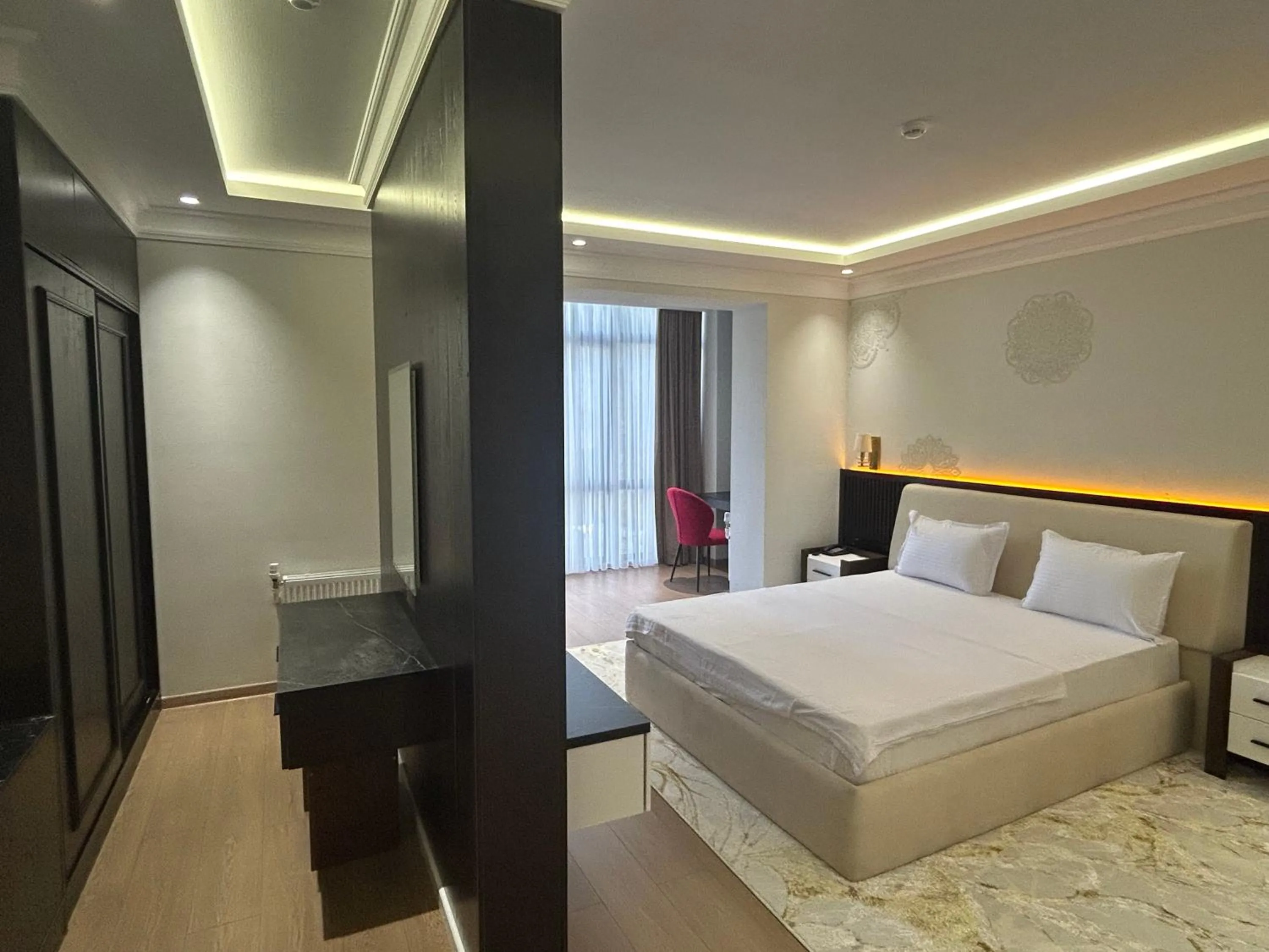 Photo of the whole room, Bed in Karim Parkside Hotel