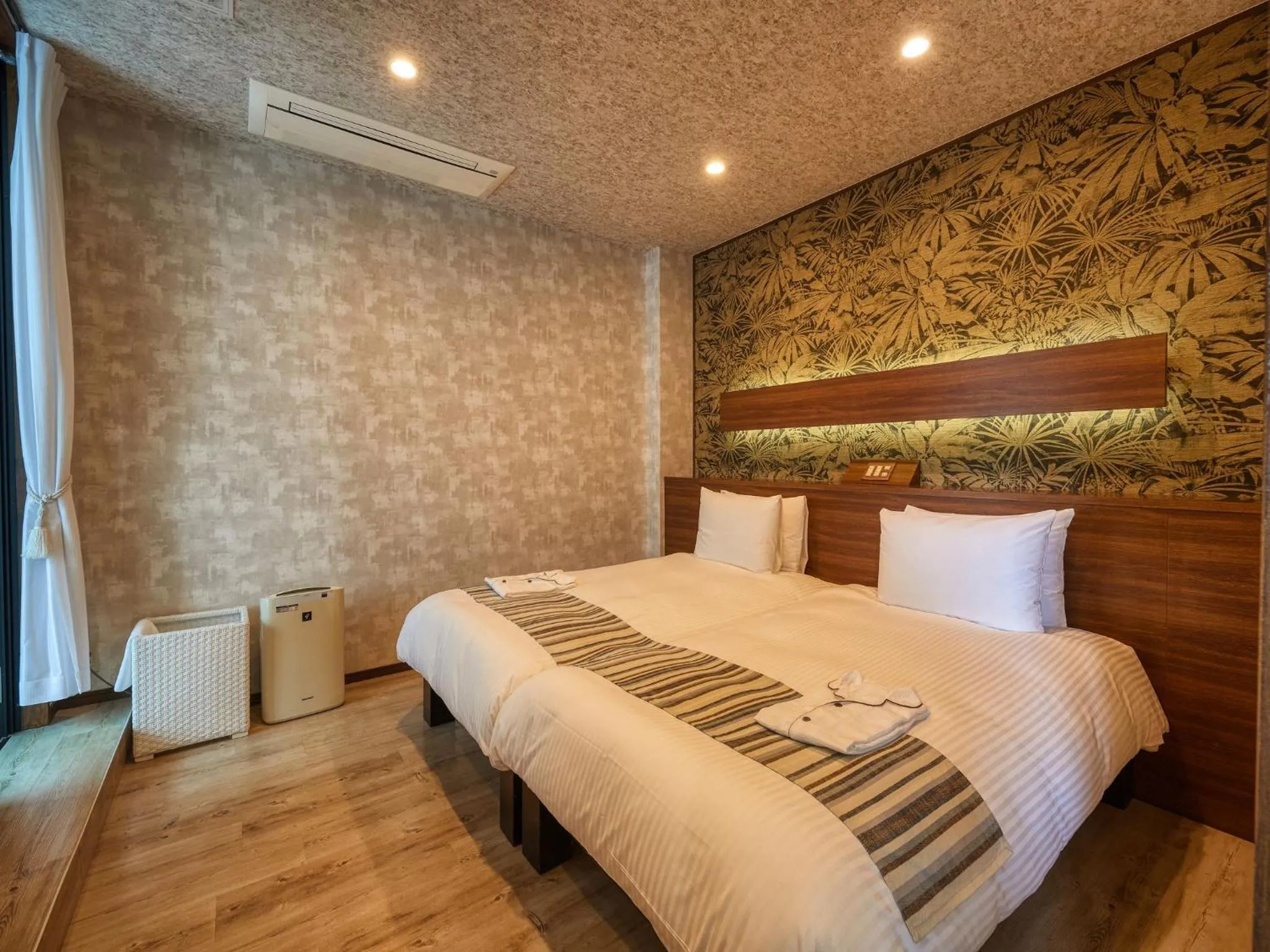 Photo of the whole room, Bed in La Casa Panacea Okinawa Resort