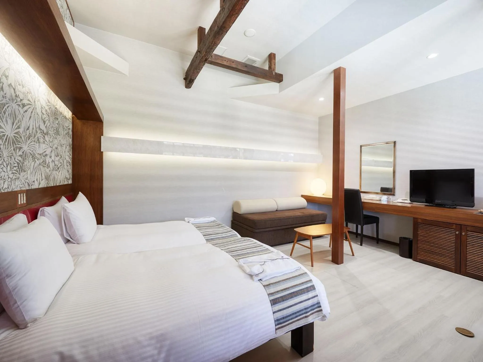 Photo of the whole room, Bed in La Casa Panacea Okinawa Resort